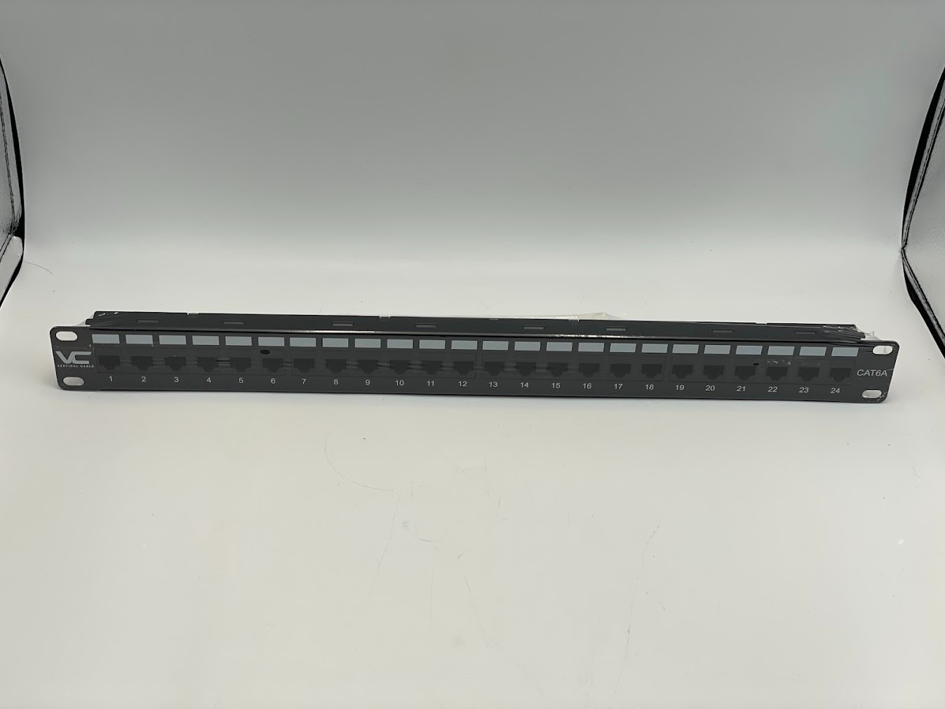 Vertical Cable 1U Blank Patch Panel Without Label Holders - Black
