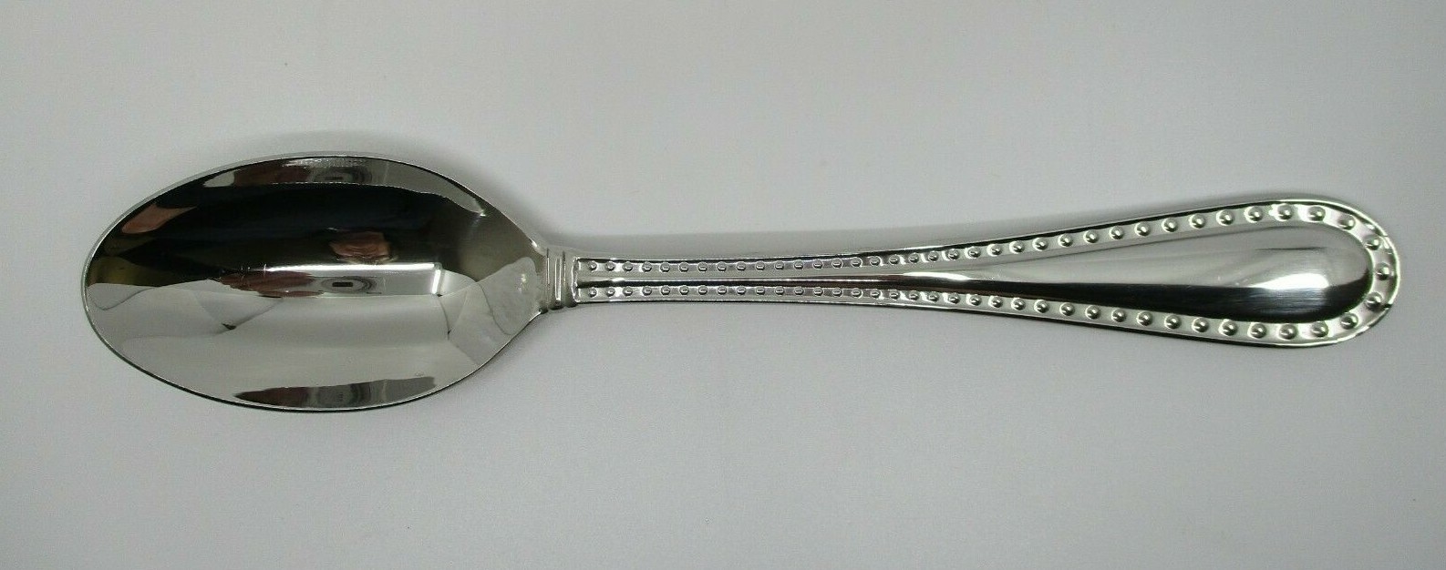 RICCI STAINLESS RIVETS GLOSSY SERVING SPOON - 9 3/4" 12H