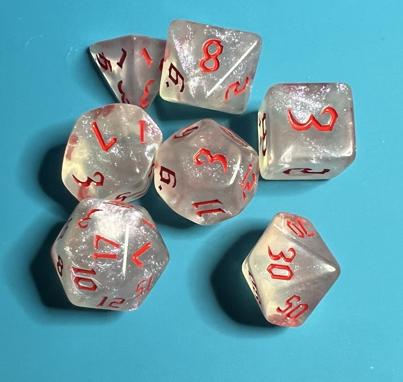 7-Piece Polyhedral RPG Dice Set – Clear Crystal Glitter w/ Red Numbers RPG
