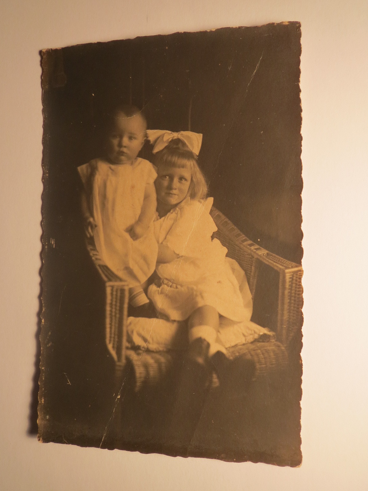 2 children - girl and baby - probably siblings / photo