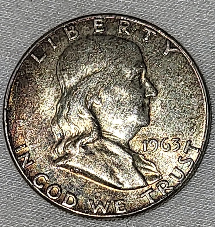 1963 Toned Franklin Half Dollar in BU Condition with Rainbow Toning