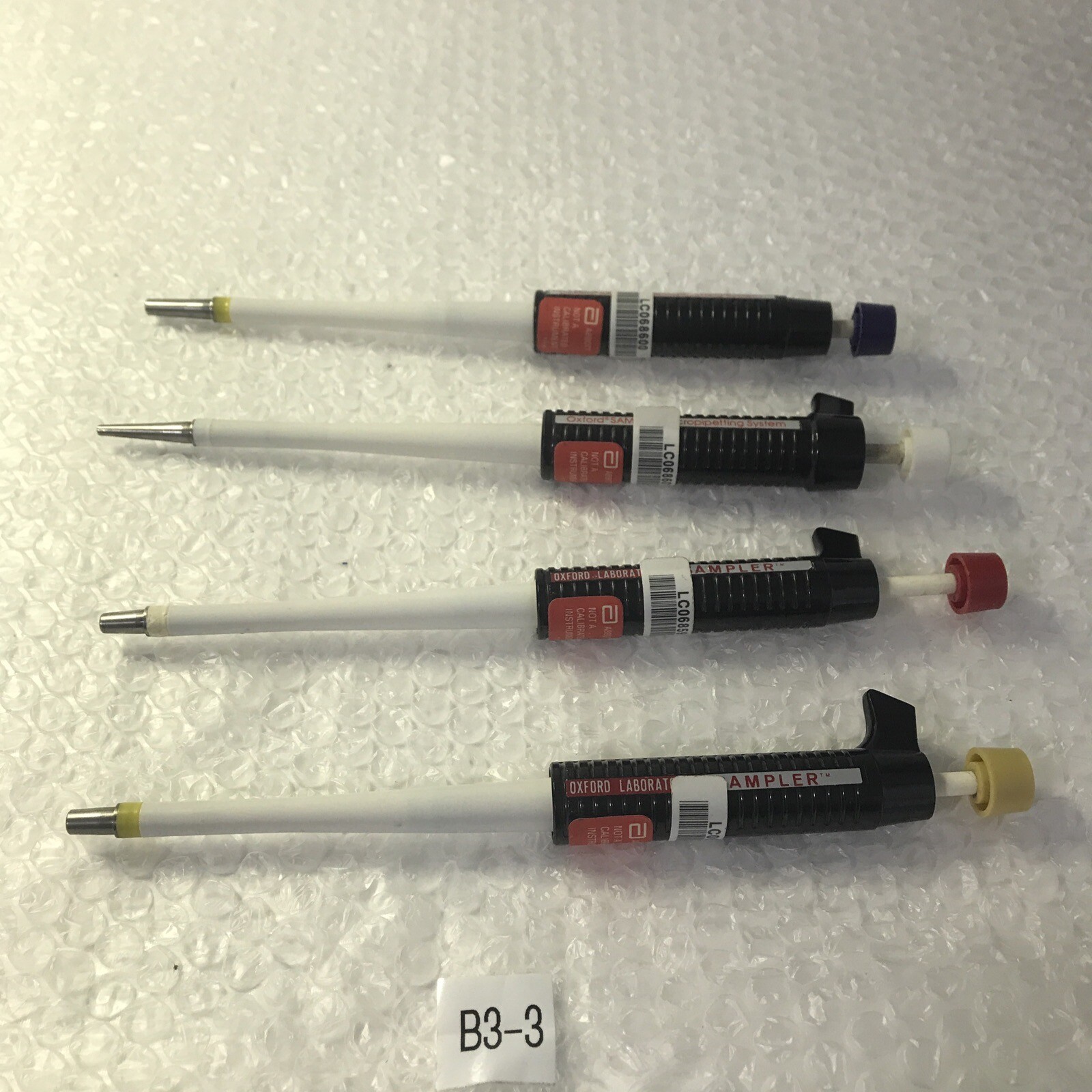 *Preowned Abbott (Lot Of 4) Oxford Precision Sampler Micropipetting System #