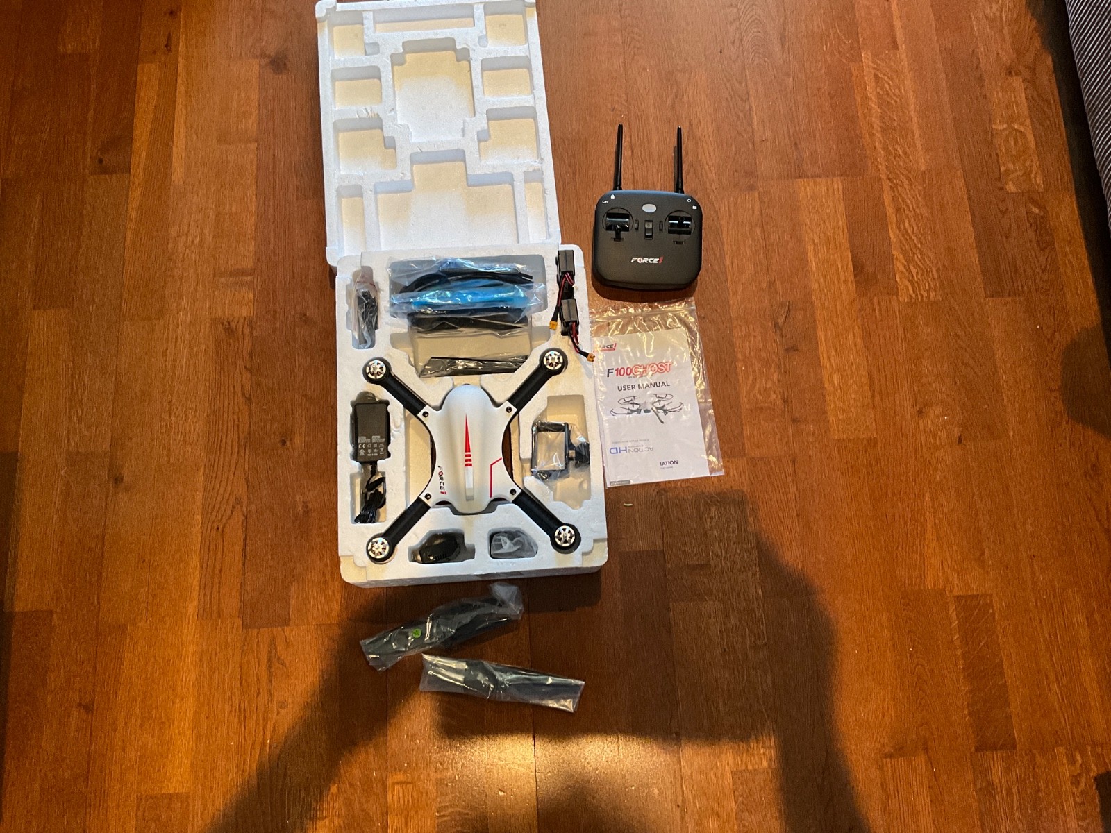 New in box F100 GHOST Force1 brushless drone in original box 2 batteries 3 shell
