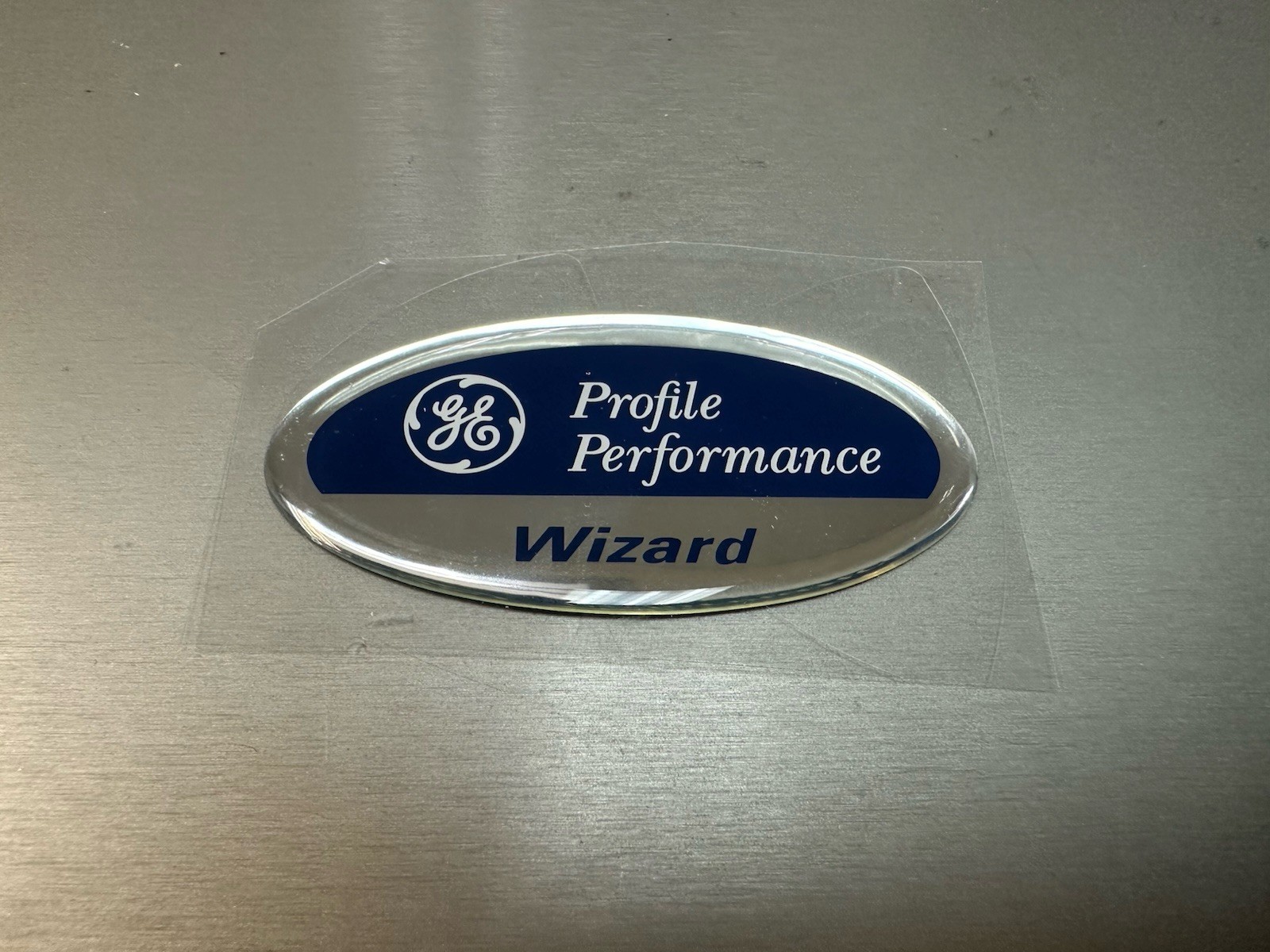 GE Profile Performance Wizard Refrigerator PU dome Nameplate Badge, OEM New Blue