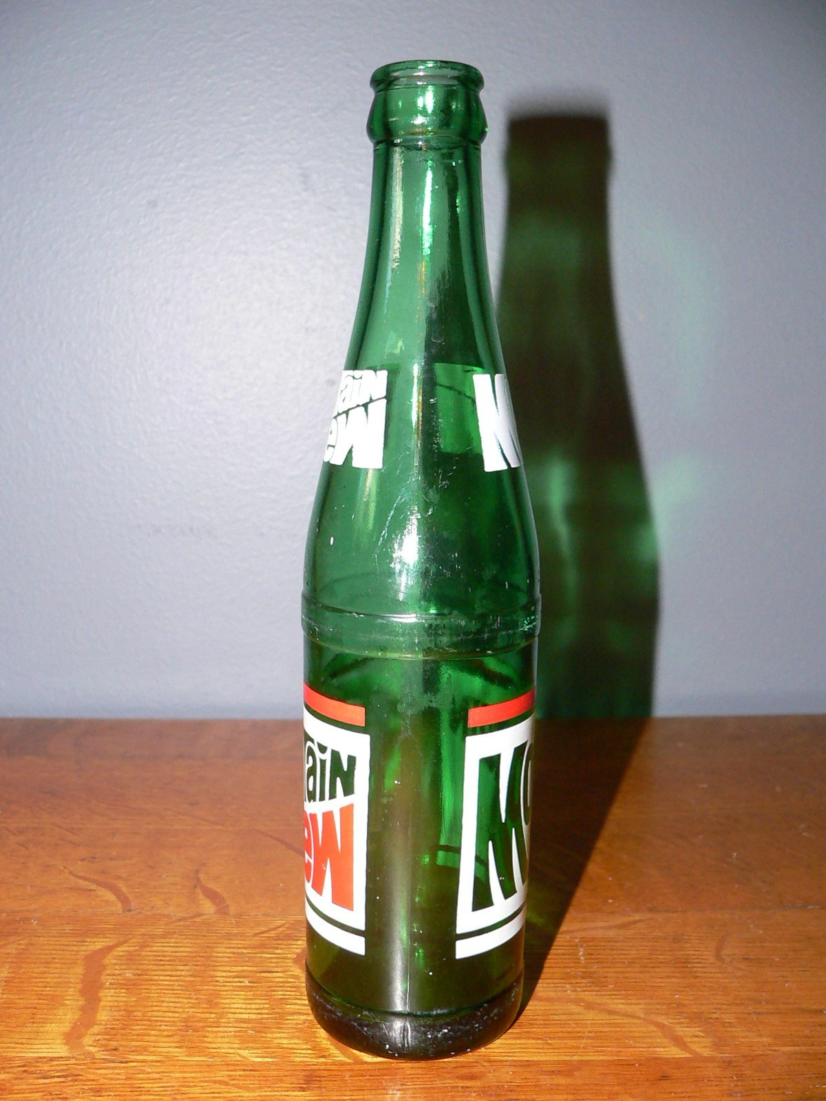 Vintage Mountain Dew Empty 10 oz Bottle with Red & White Classic Logo