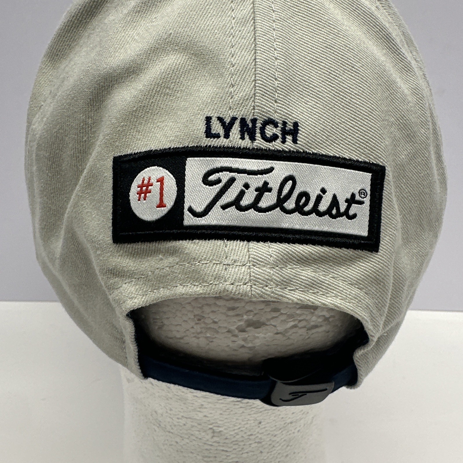 Titleist Golf Strap Back Hat Beige Cap Embroidered #1 Lynch Adjustable