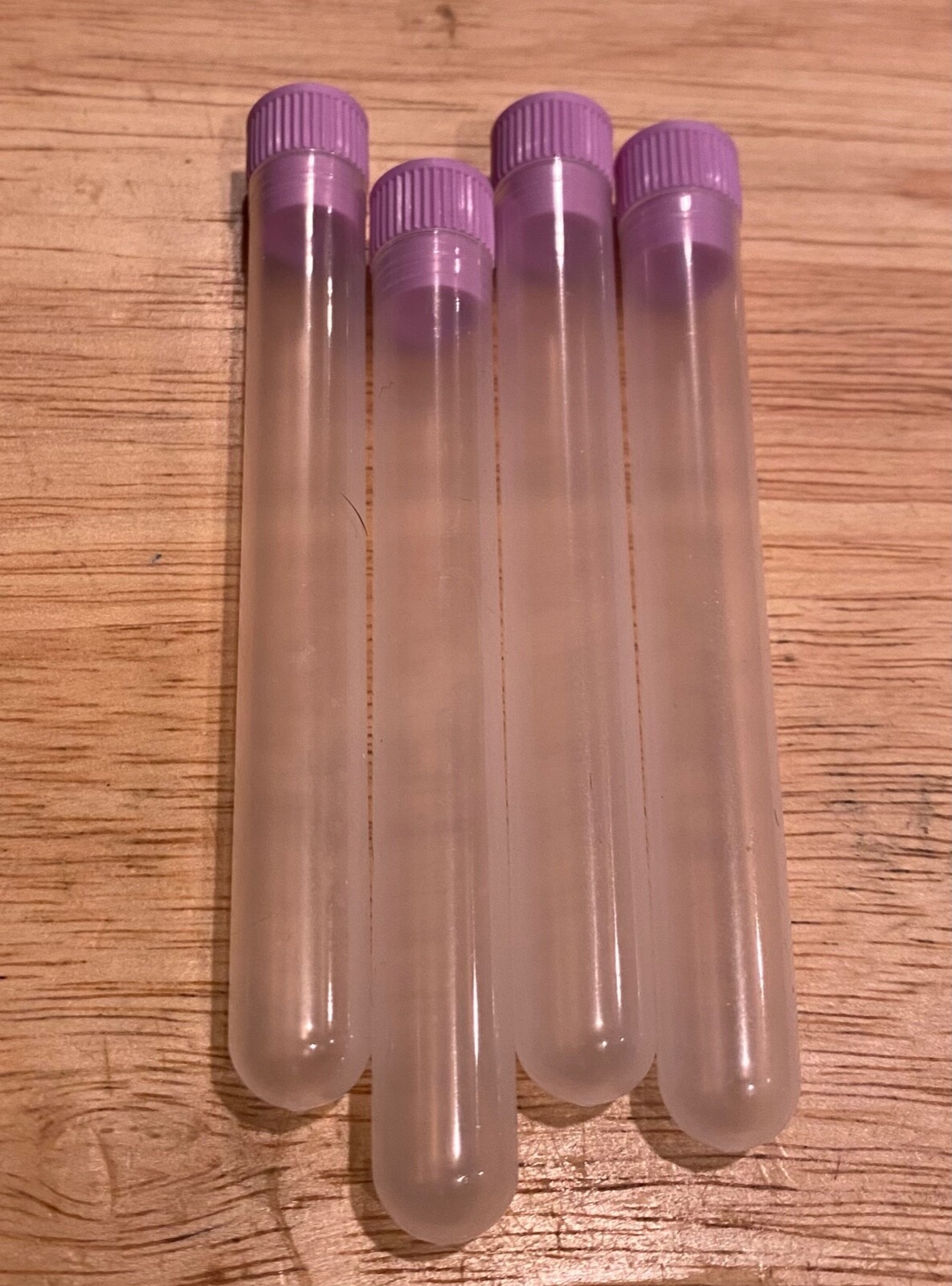Lot of 16 Plastic Bead Storage Tubes.