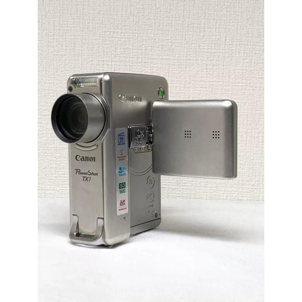 Canon PowerShot TX1 Digital Camera 7.1 MP 10x Optical Zoom Image Stabilization