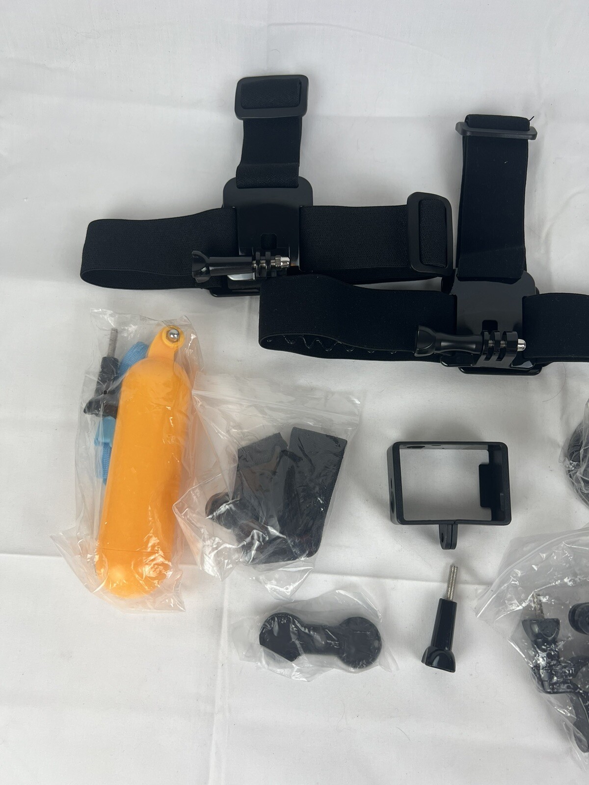 Lot of GoPro Accessories (Head Strap, Joints, Floatable Handle)