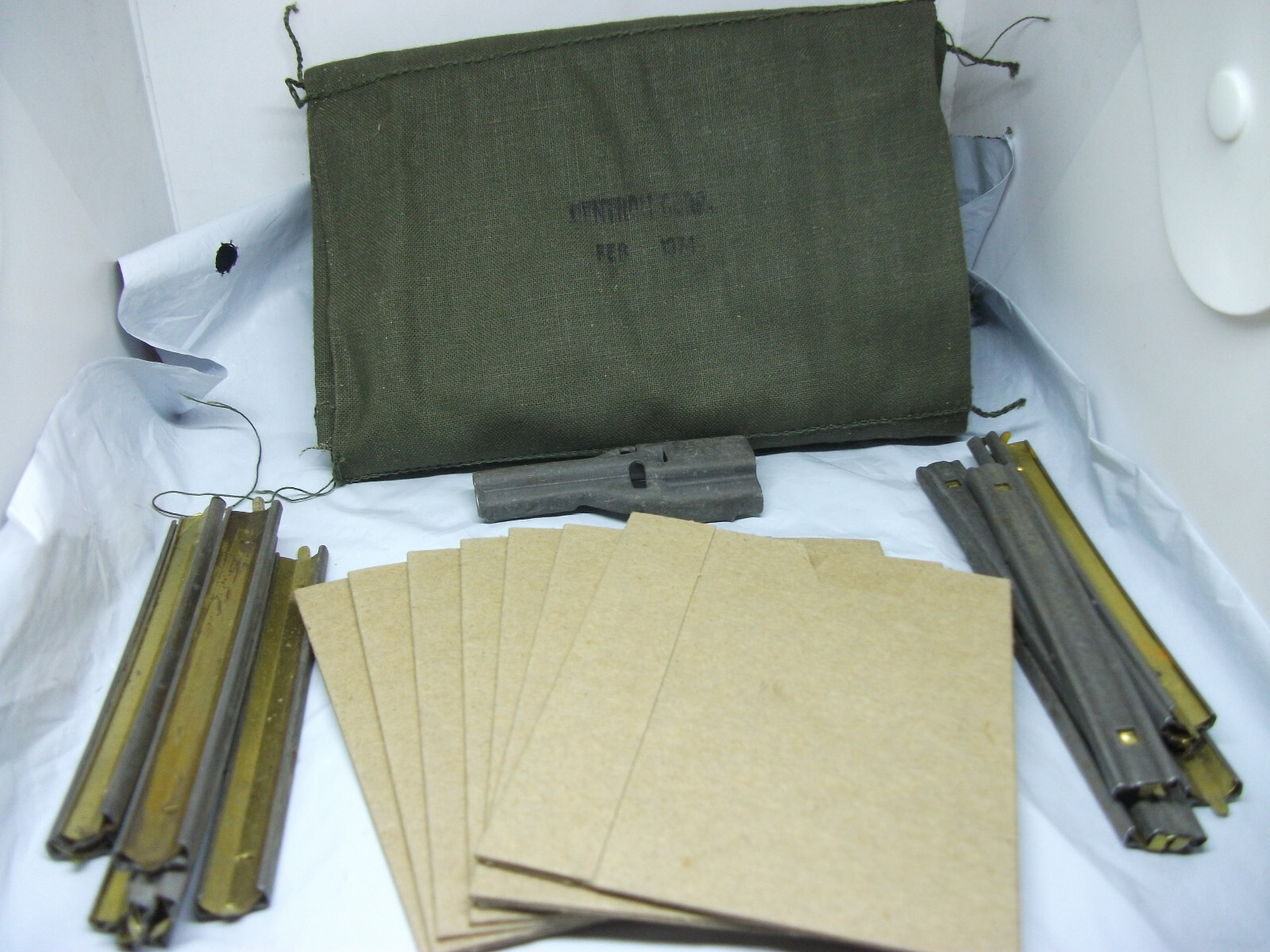 U.S.G.I. VIETNAM ERA 7 pocket 5.56  BANDOLIER kit, complete. NOS Bandolier.