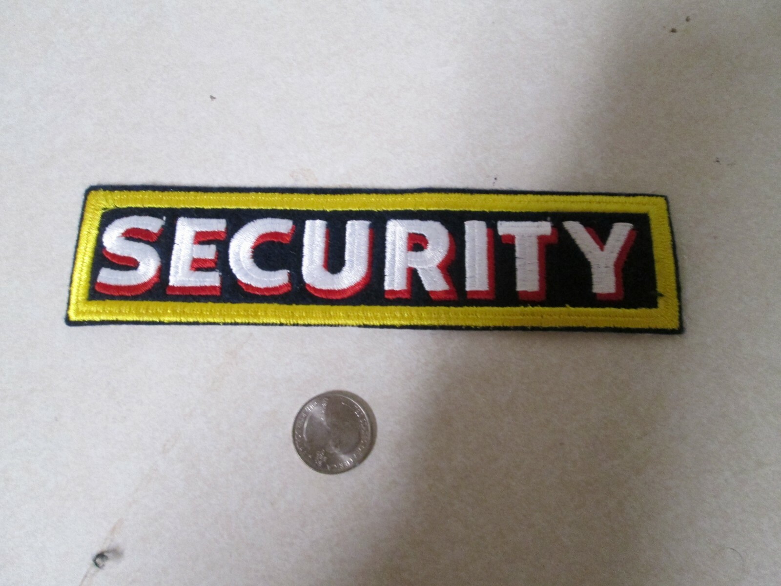 PATCH OLDER SEW ON SECURITY OVER 7 INCHES LONG BY 2 INCHES
