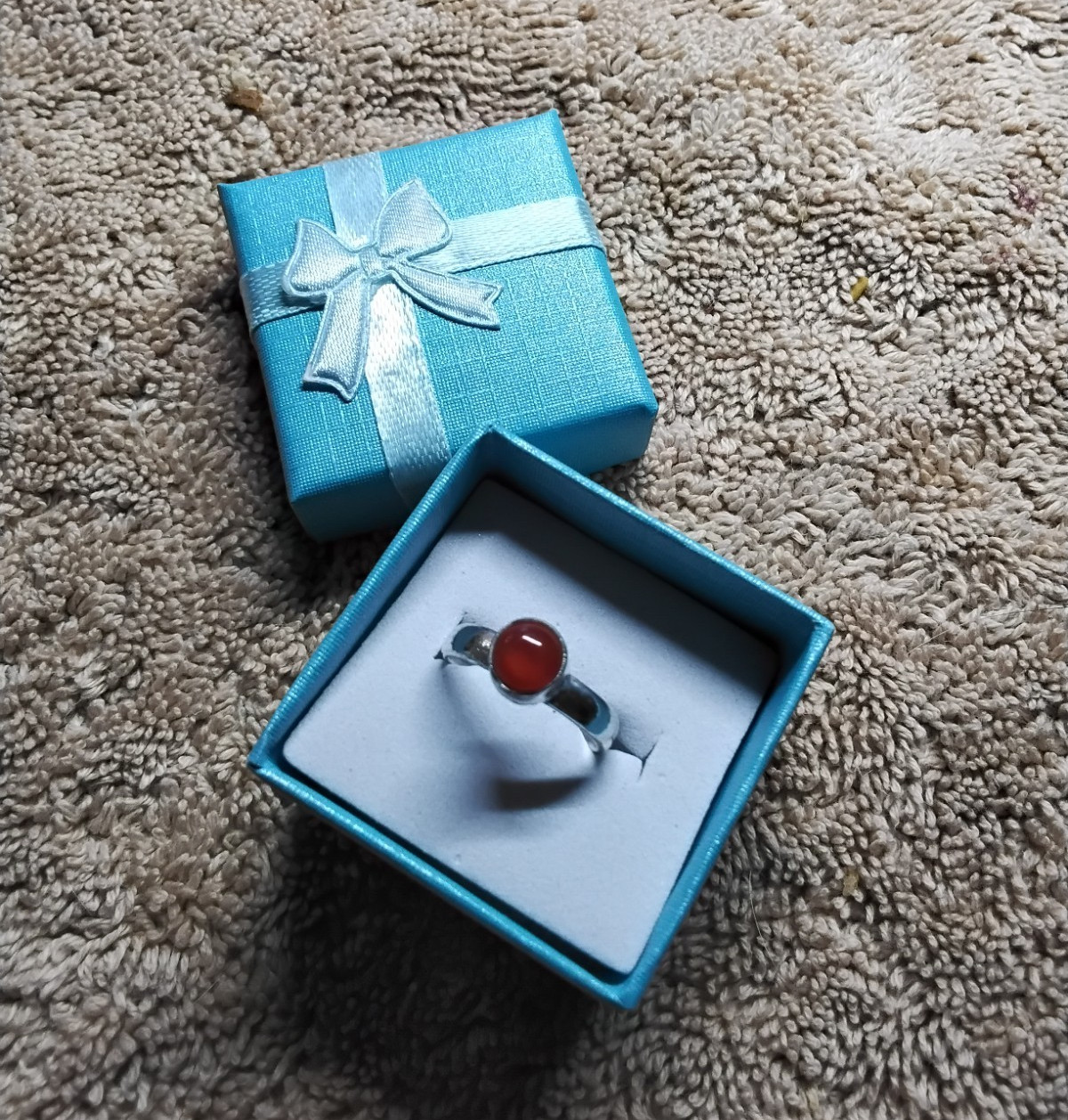 Mandarin Red Carnelian Pinkie Ring. Set In Rhodium Plated Mounting.   Size 4.75.
