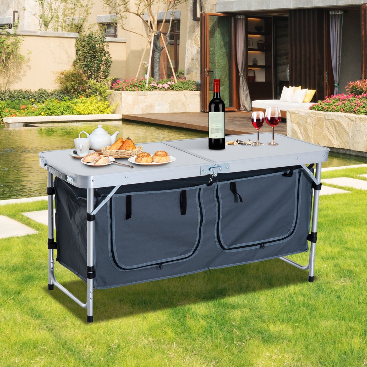 Portable aluminum camping table, foldable with handle and organizer.