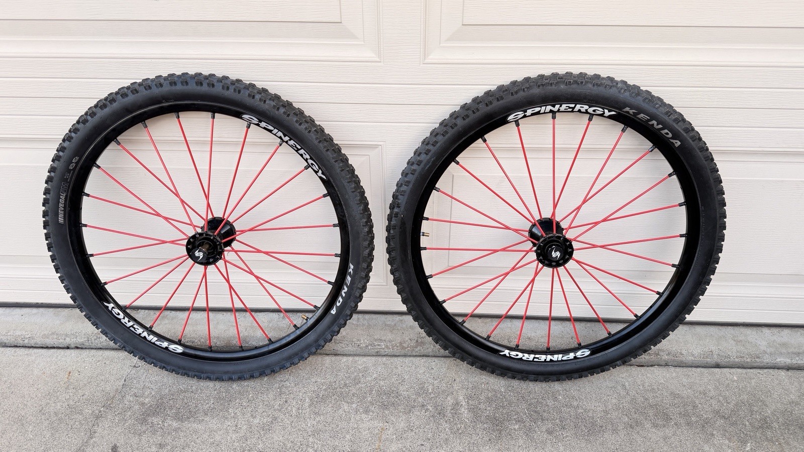 Spinergy 24” Wheelchair Wheels, W/Kenda Nevegal NM 24x2.1 Tires, 24 Red Spokes.