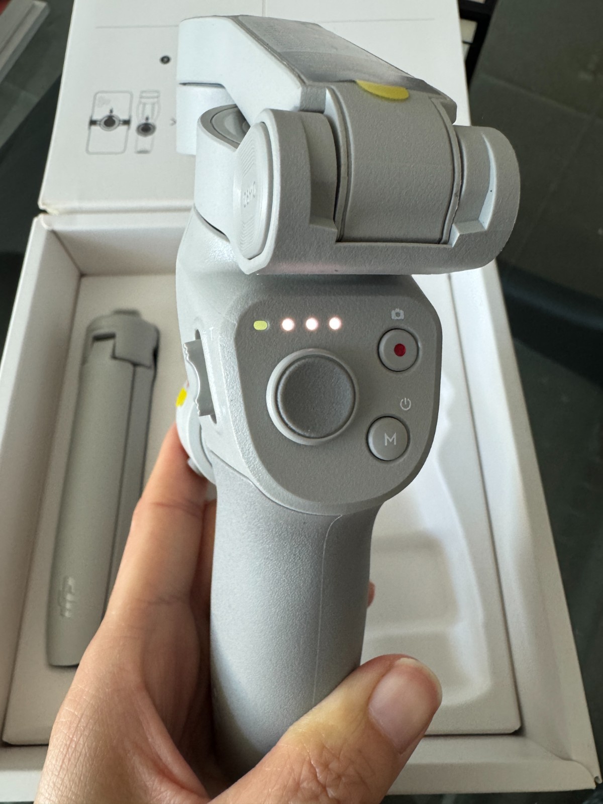DJI OM 4 smartphone gimbal stabilizer kit.