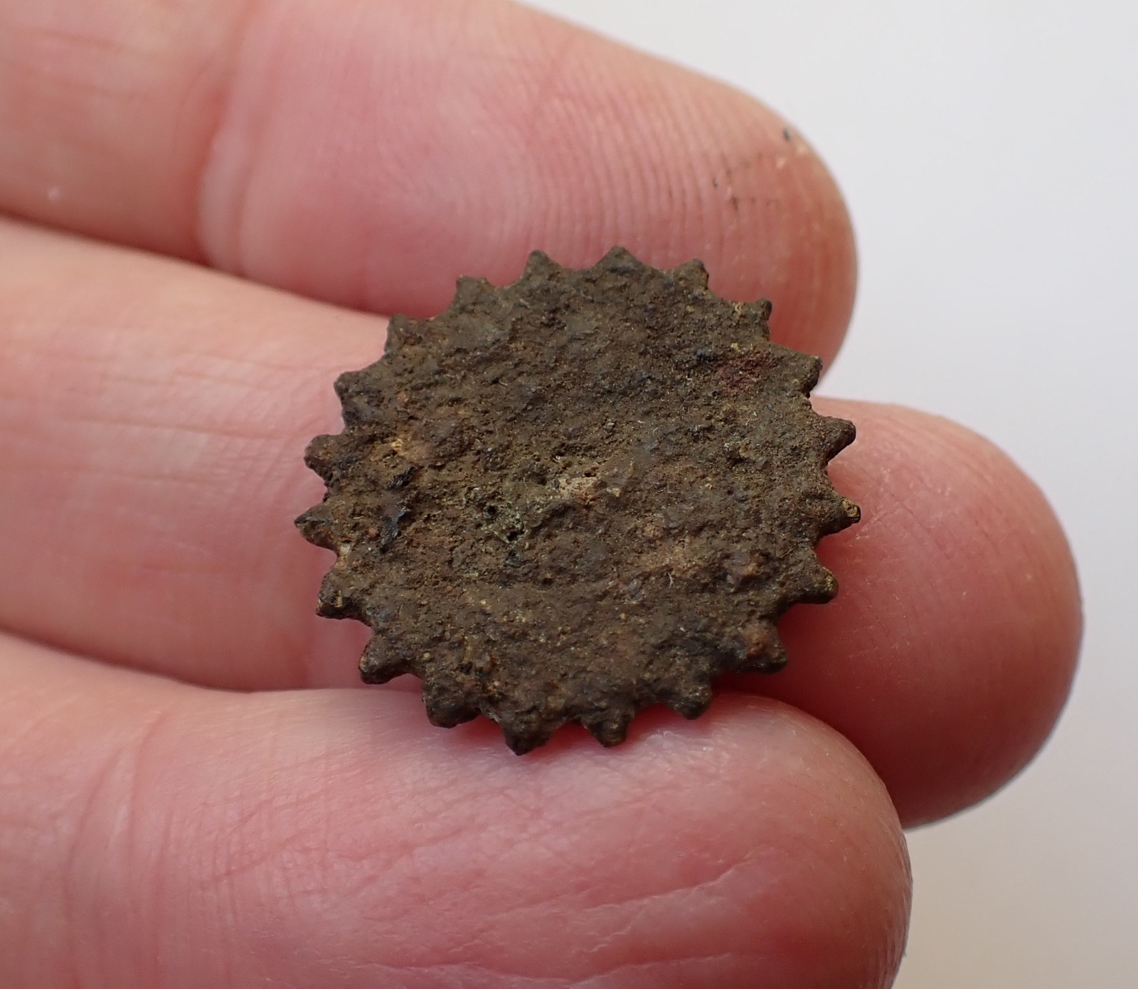 A rare Whizzer or Whirligig made of a Dutch copper duit - A Colonial era toy.
