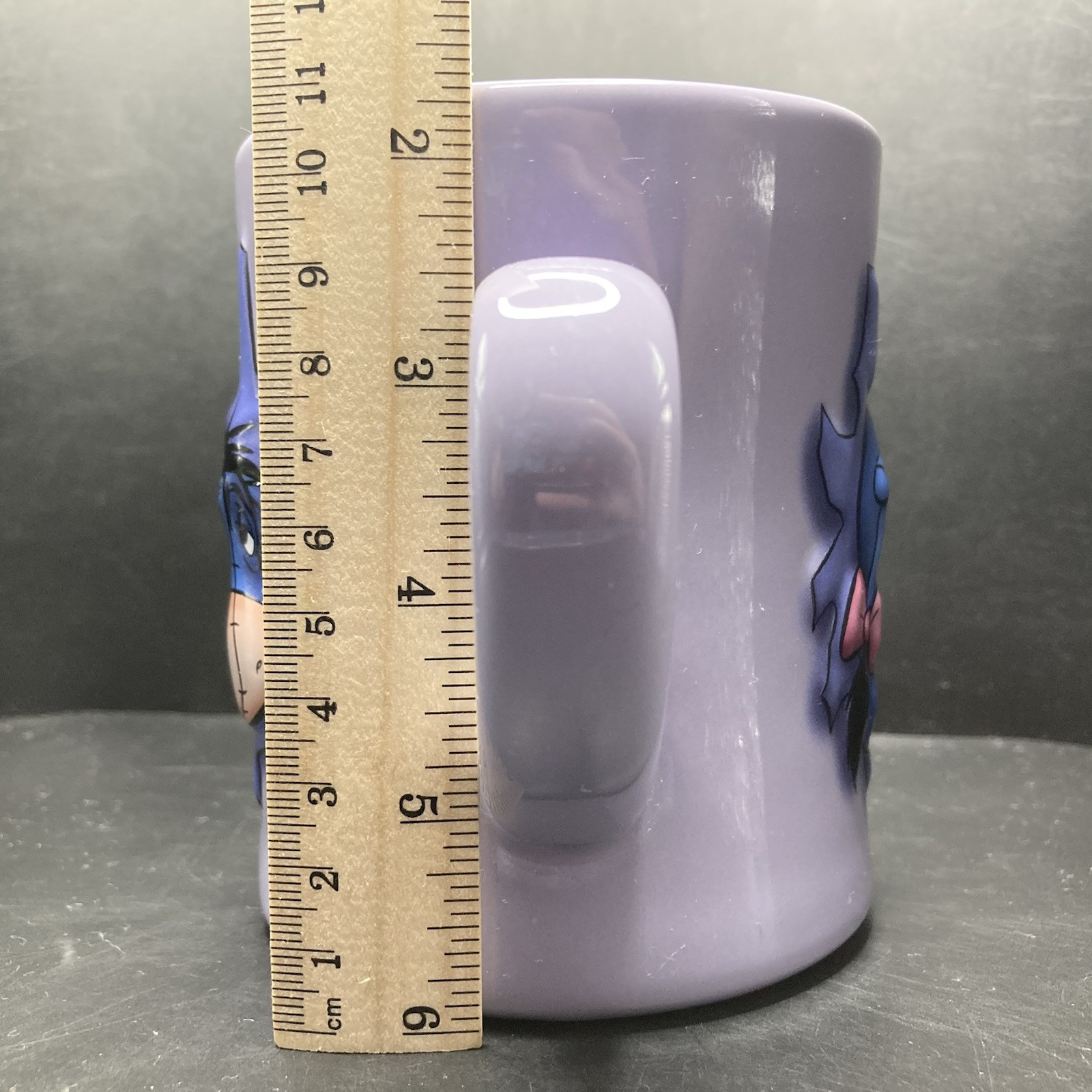 Disney Store Eeyore Bursting Through a Wall LARGE Purple Embossed Ceramic Mug