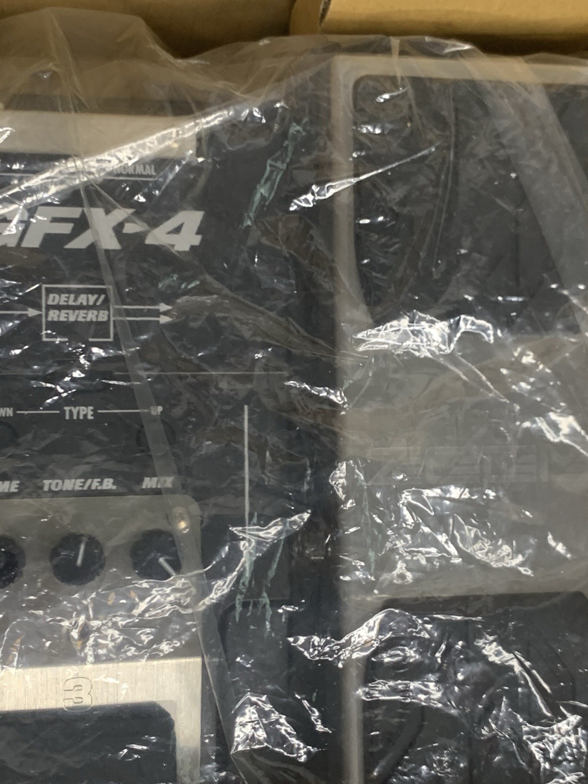 Zoom GFX-4 guitar effects processor packaged in its original white Box