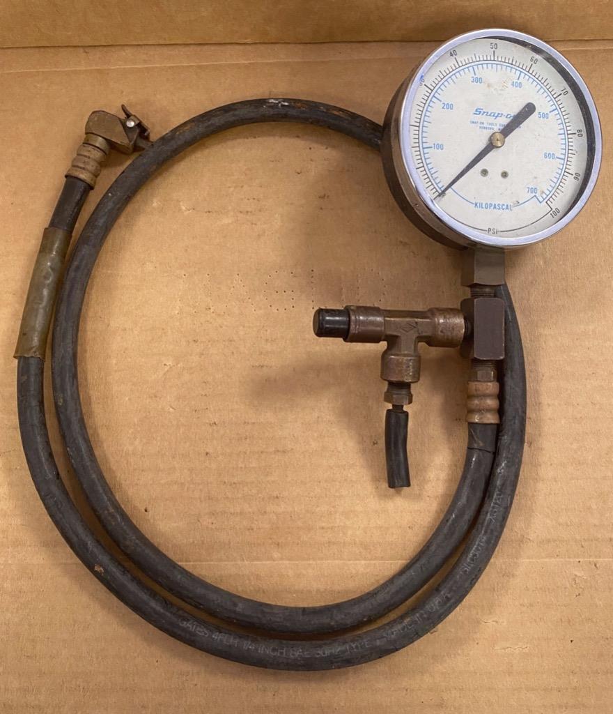 SNAP-ON 700 KILOPASCAL 100 PSI COMPRESSION TESTER- USED.