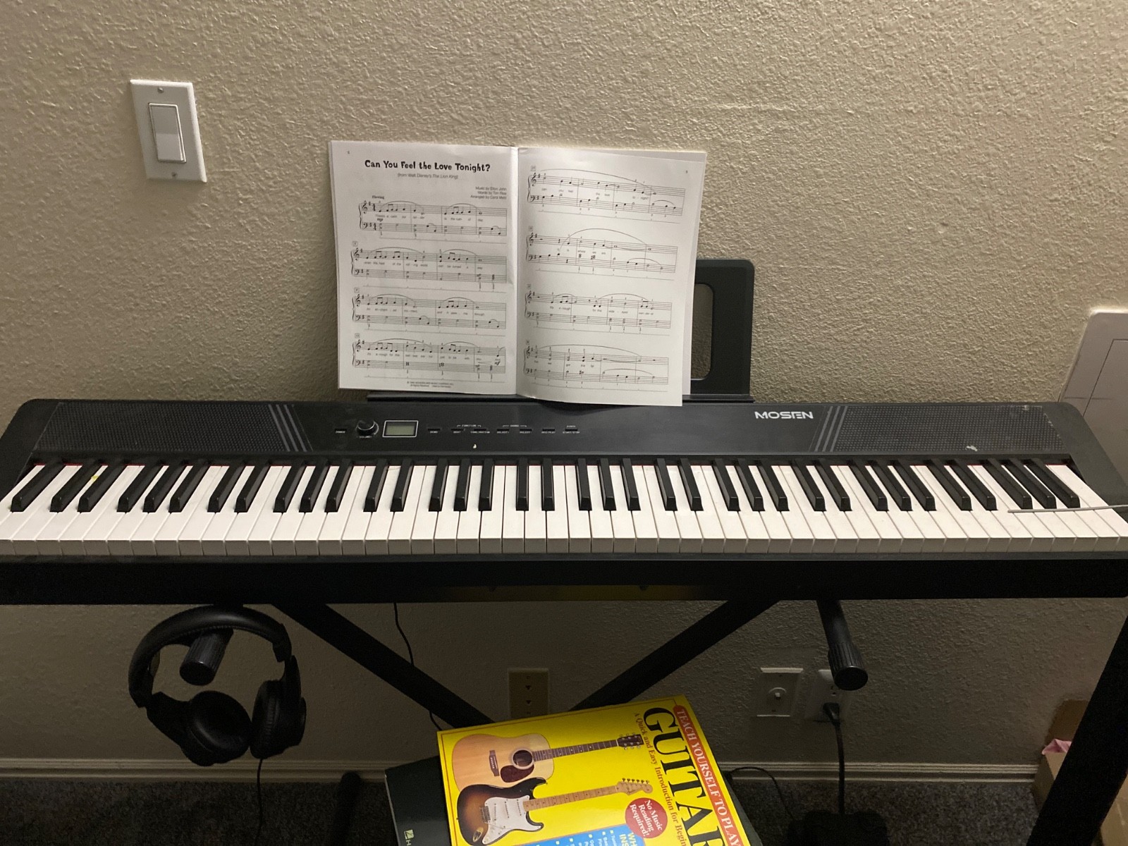 Used keyboard piano-Brand Mosen. Includes headphones foot pedal and 3 books