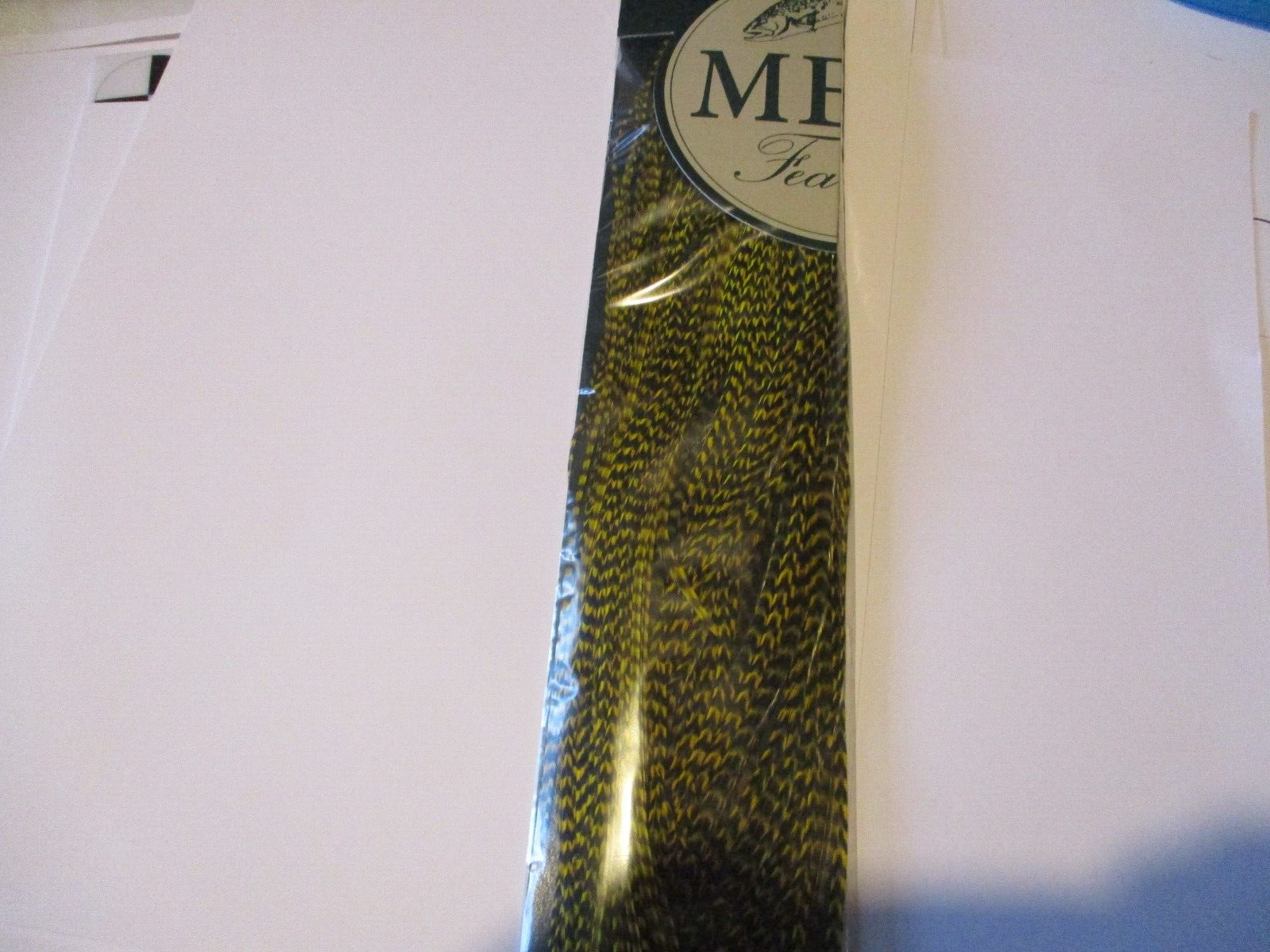 metz saddle grade 2 rooster cape hackle feathers yellow grizzle half