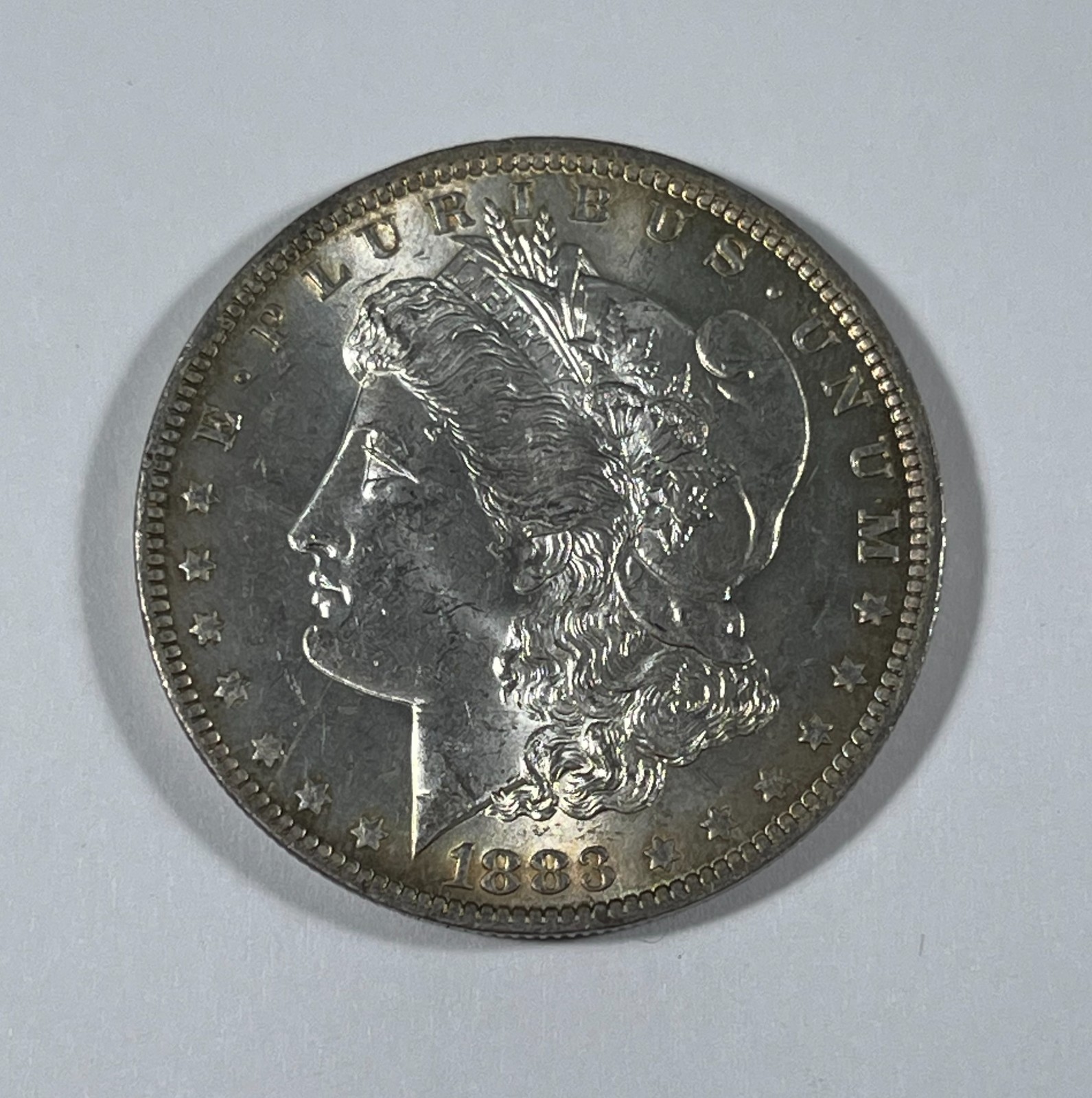 1883-O Morgan dollar (#21867) Ch BU Lite  toning