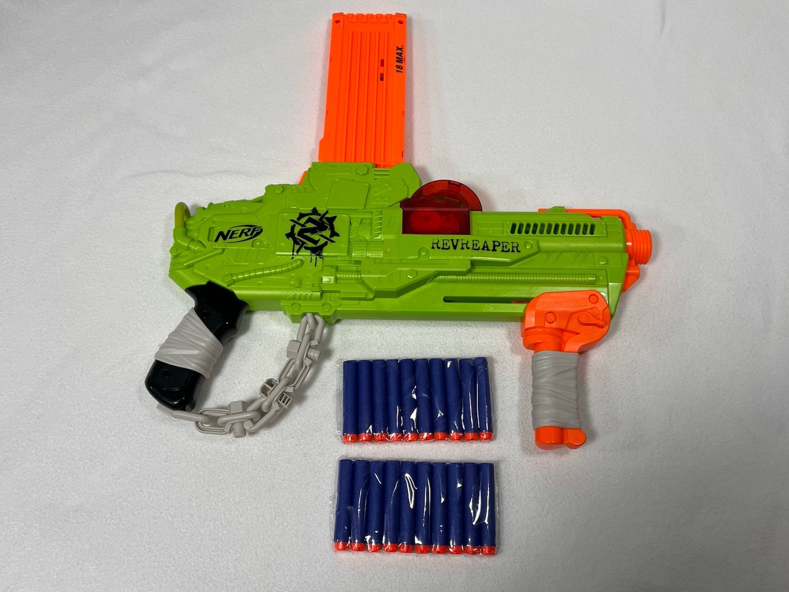 Nerf Zombie Strike RevReaper Blaster w/ 18-Round Mag Chain Darts