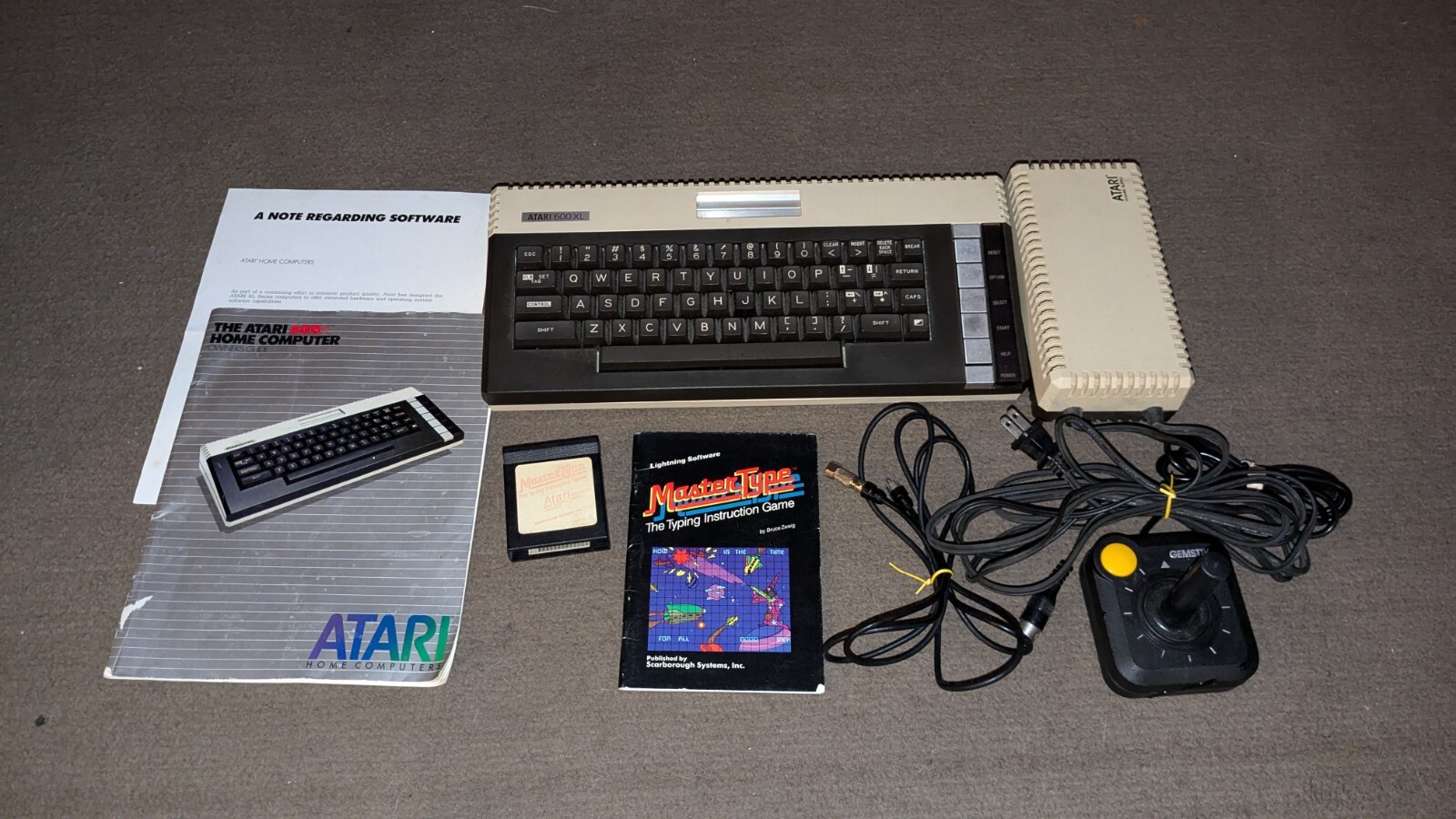 Atari 600XL Home Computer Complete W/ Manual And Hook Ups Game Is Master type