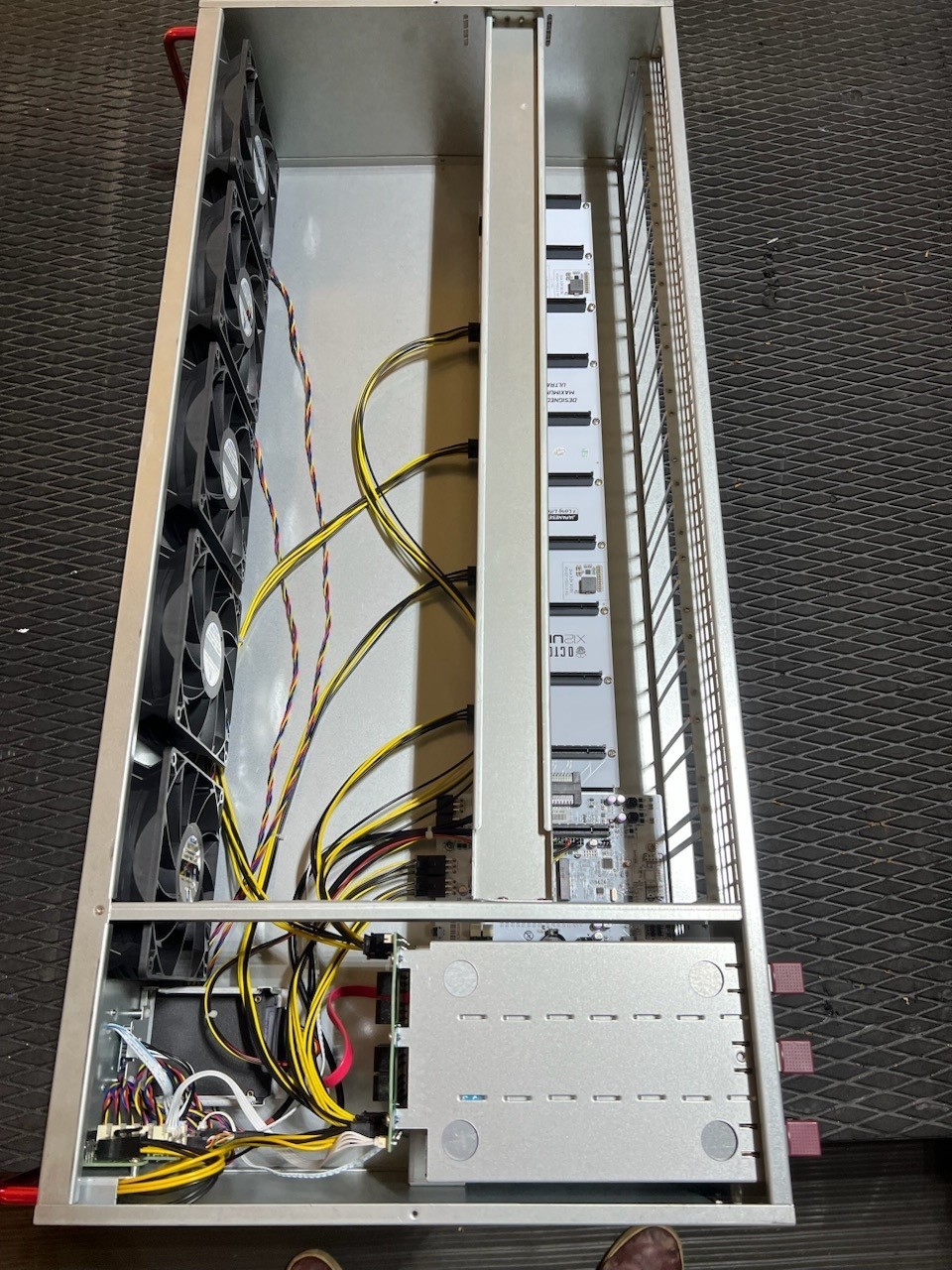 Bulk lot of 60 Octominer X12ULTRA 12-GPU mining rigs. No graphics cards are inc