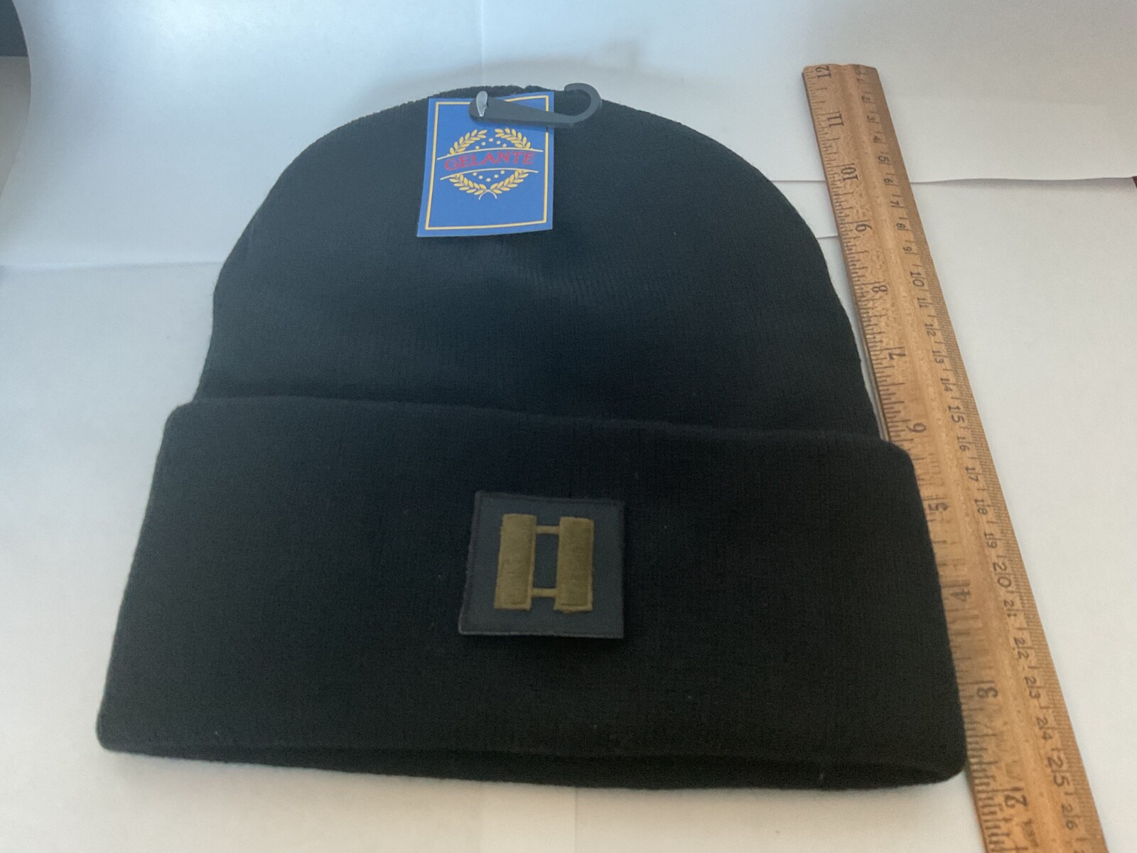 Police Captain Olive Drab color Patch Sewn on a Black Watch Cap