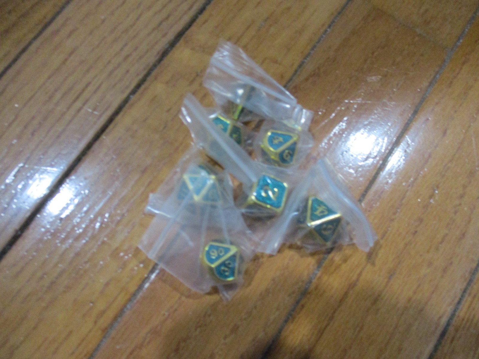 7 Piece Polyhedral Metal Dice Set Green w/Gold