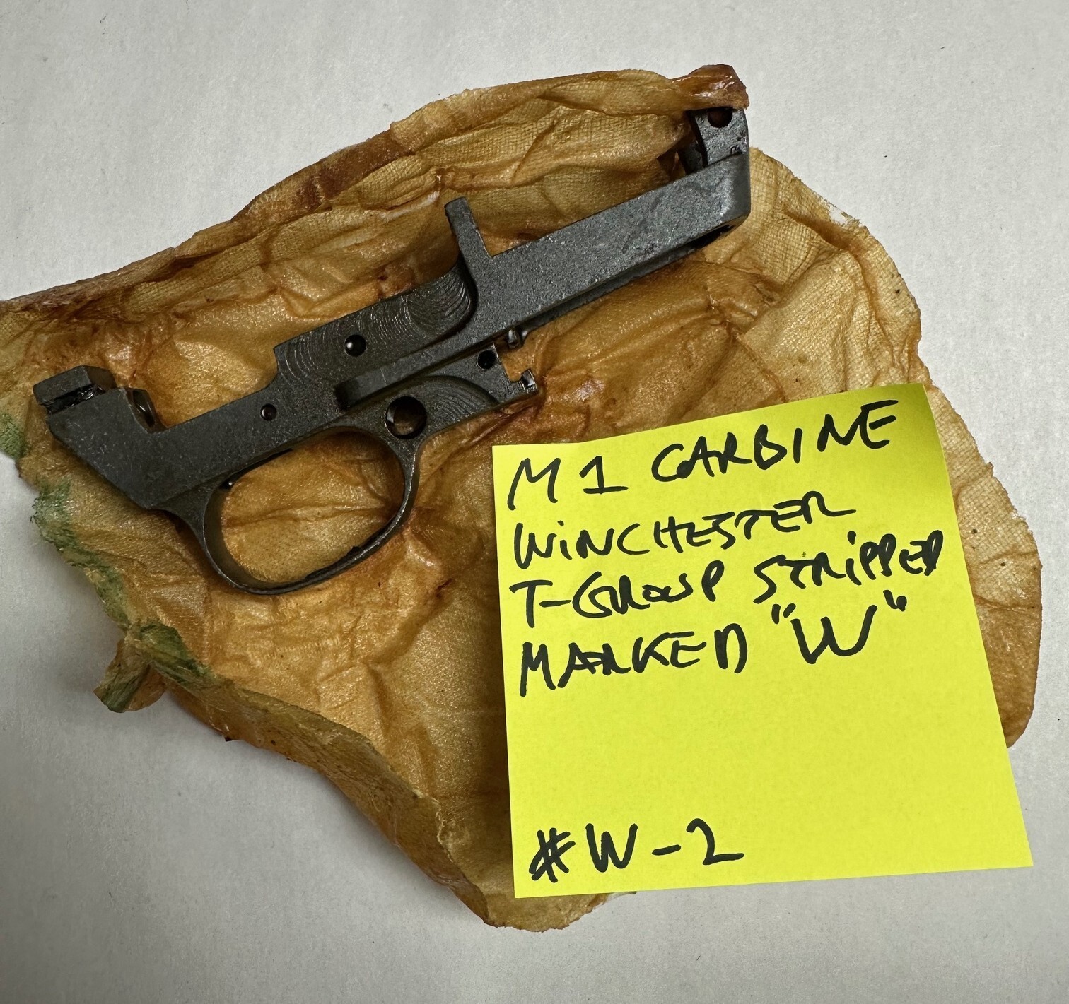 US GI WWII WINCHESTER CARBINE TRIGGER GROUP STRIPPED NEW IN ORIGINAL PACKAGE.