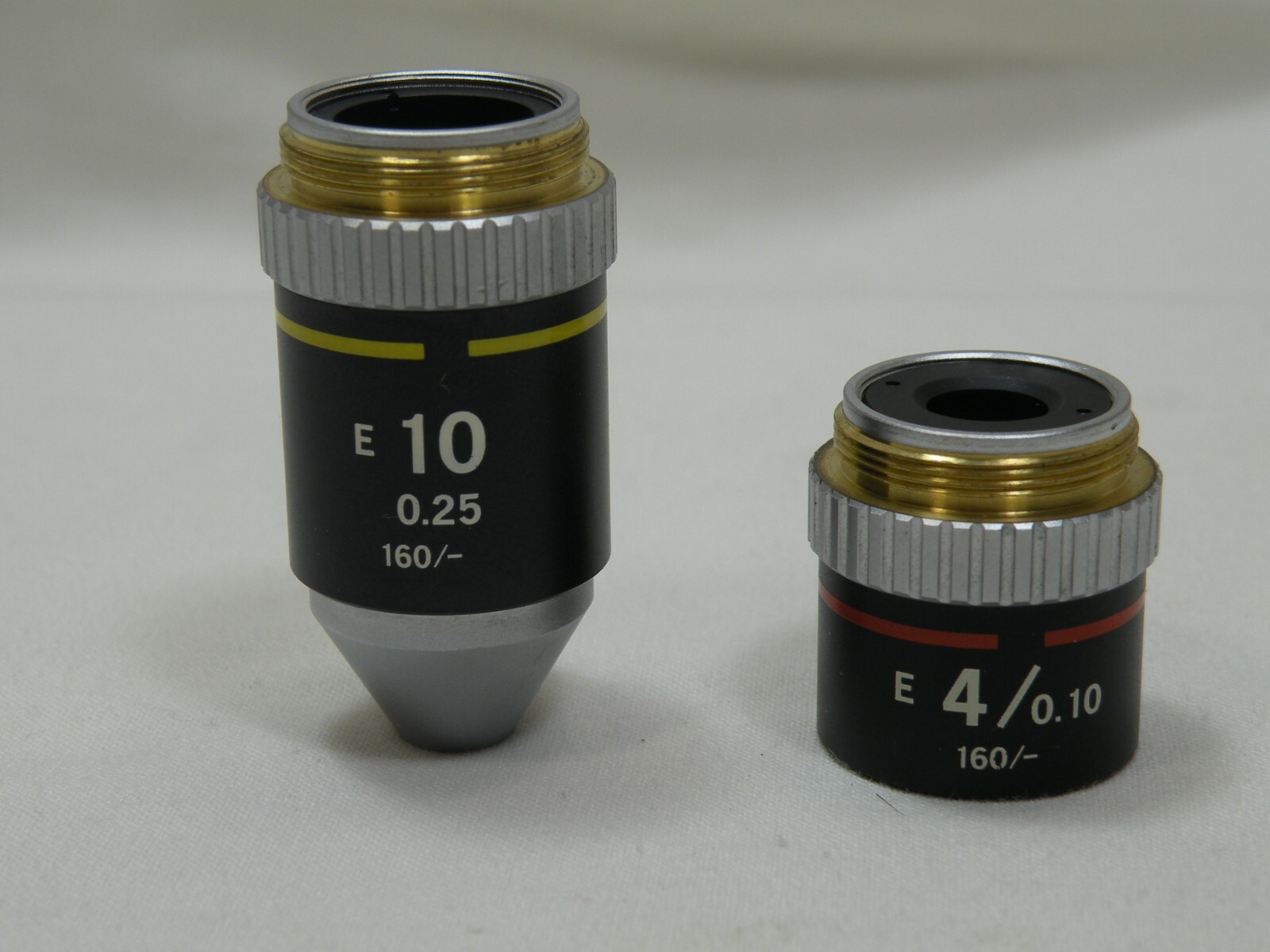 Two Nikon Microscope Objectives, One E 10/0.25 160/- & One E 4/0.10 160/-