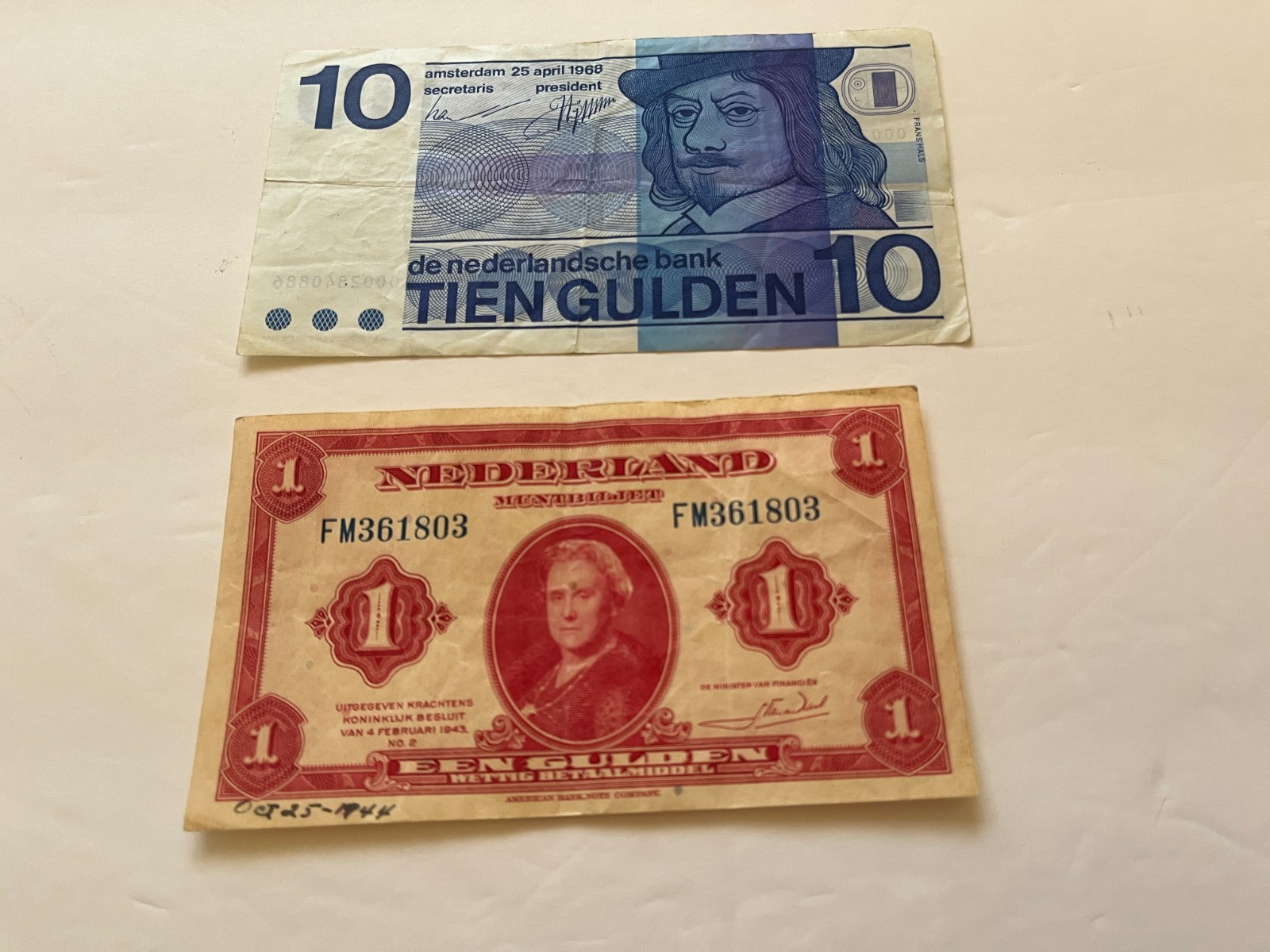 netherlands paper money, 2 older dutch bills - 1  fl - 1943 , 10 fl -1968