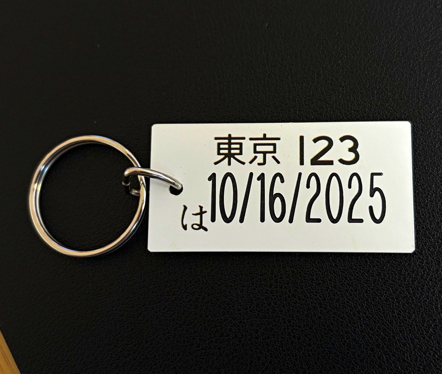 LARRY CHEN AUTOGRAPHED License Plate Style Keychain Black Silver