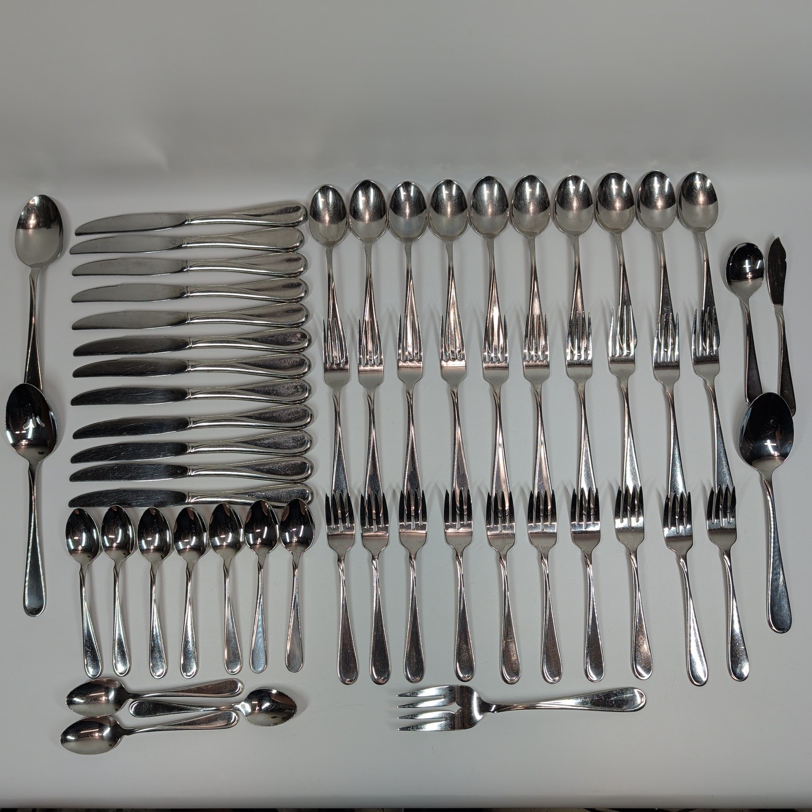 Oneida Flight 58-Piece Stainless Steel Flatware Set Service for 10 w/extras USA