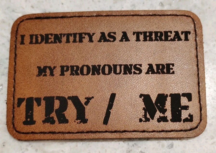 I Identify As A Threat Pronoun Funny Morale Patch Hook & Loop 3x2 Tan Leatherett