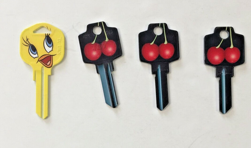 Lot of 4 Key blanksTweetie Bird & Cheeries