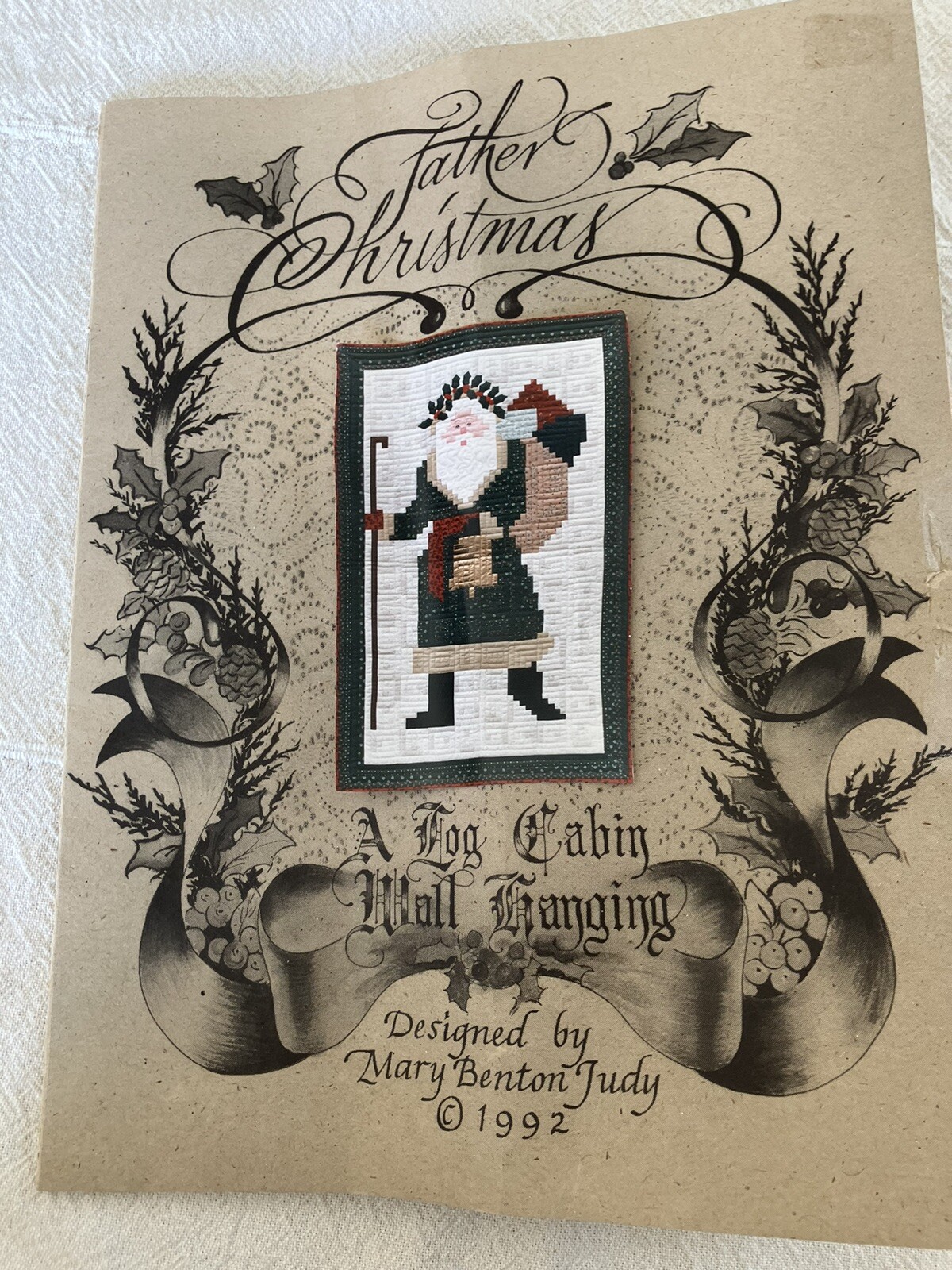 Father Christmas Log Cabin Wall Hanging by Mary Benton Judy 1992