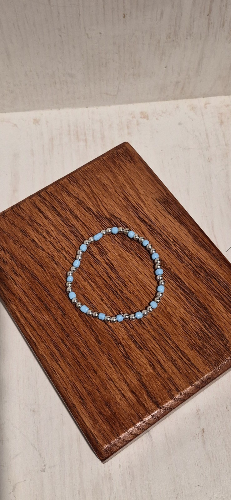 Beautiful Victory Handmade Blue And Silver Beaded Stretch Bracelet