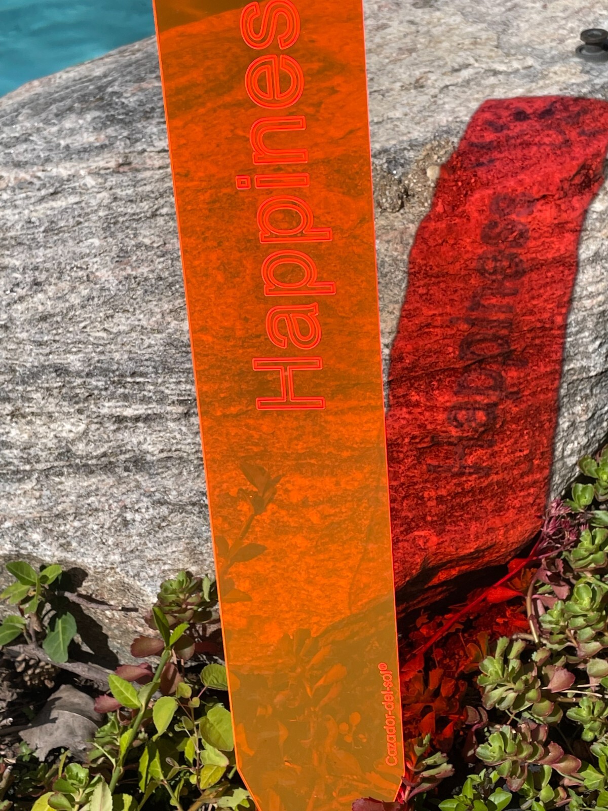 Cazador-del-sol   HAPPINES suncatcher-20" x 3"  ORANGE- Glows sunrise to sunset