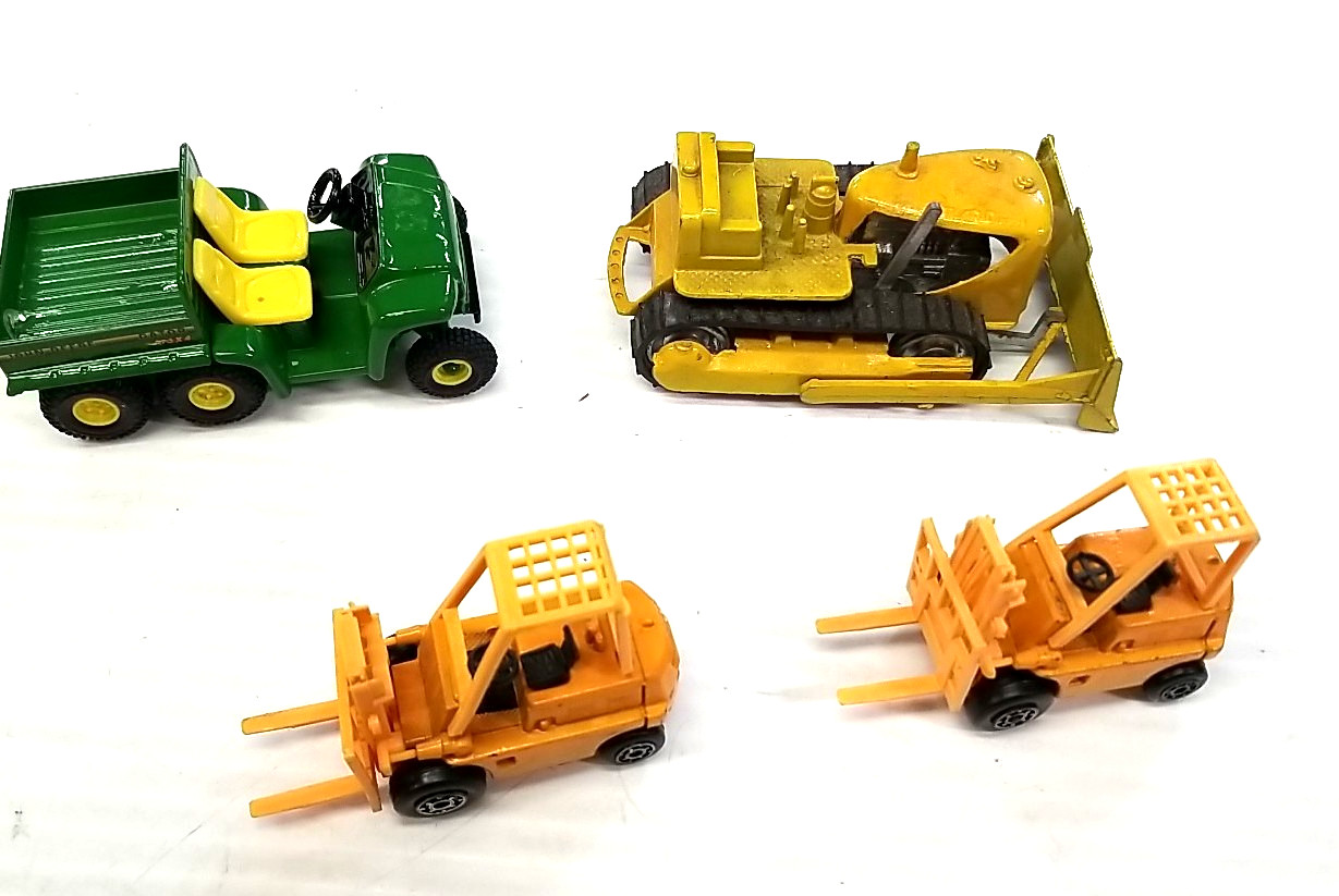Bulldozer, John Deere Gator and Two Fork Lifts Die Cast (box 349)