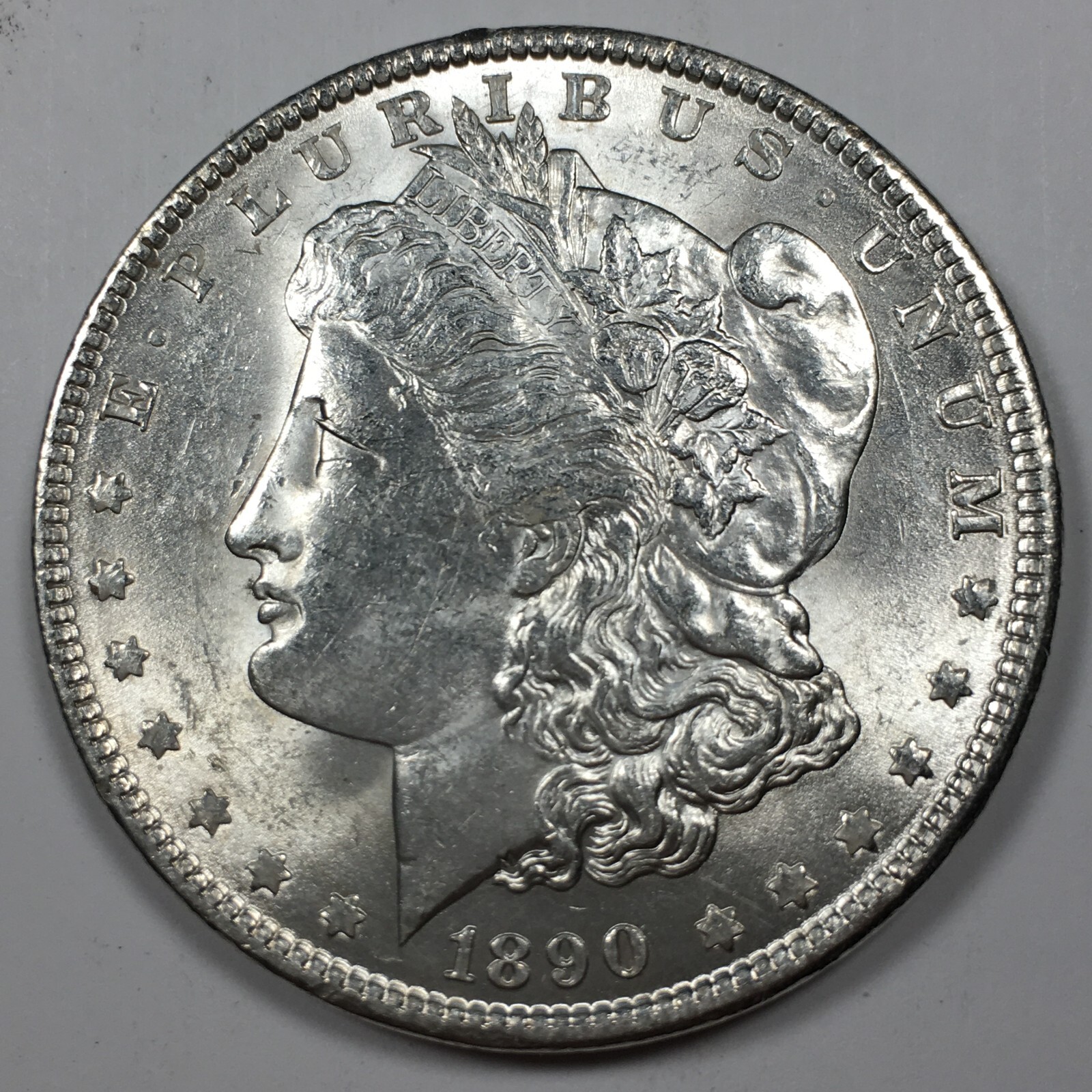 1890 Morgan 90% Silver Dollar - About Uncirculated (AU) KM#110 - 6946-SF