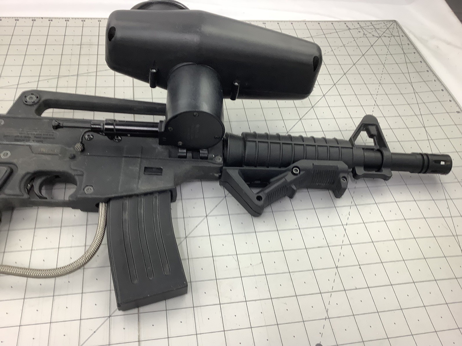 Tippmann Alpha black paintball marker with e trigger and cyclone feed untested