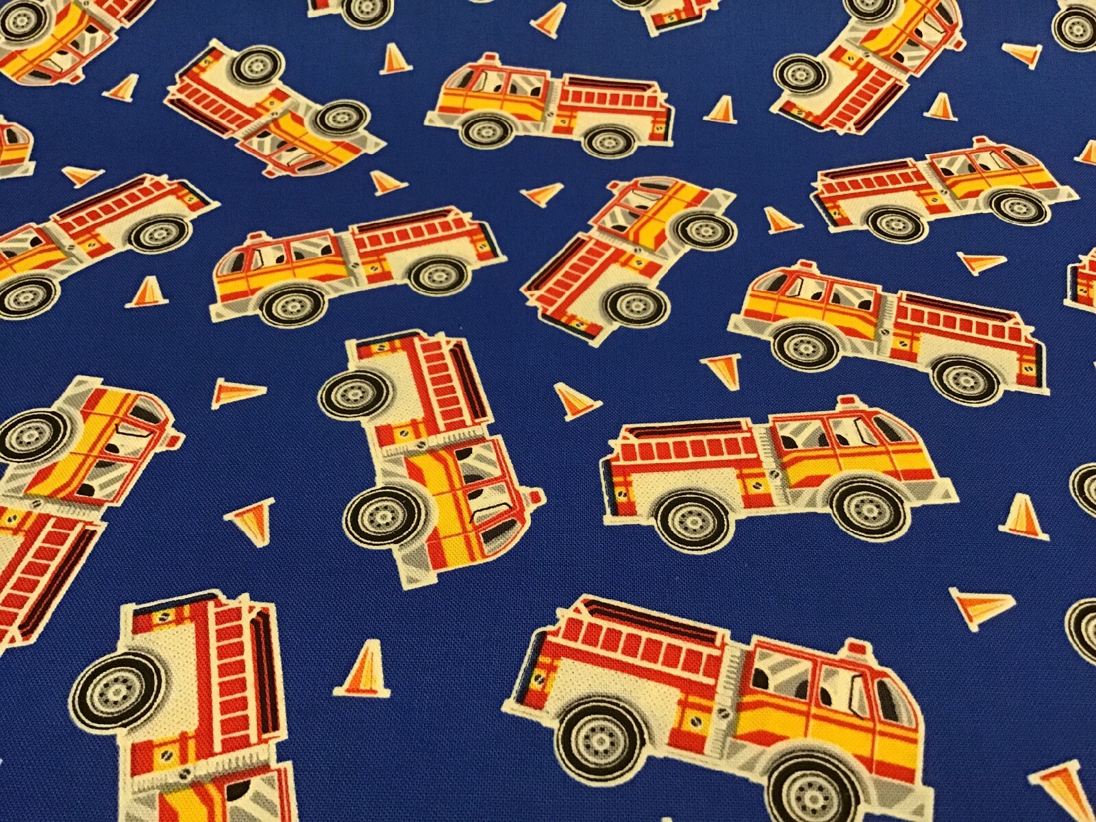 Fabric Fire Trucks Glow in the Dark 9737, sold by the yard