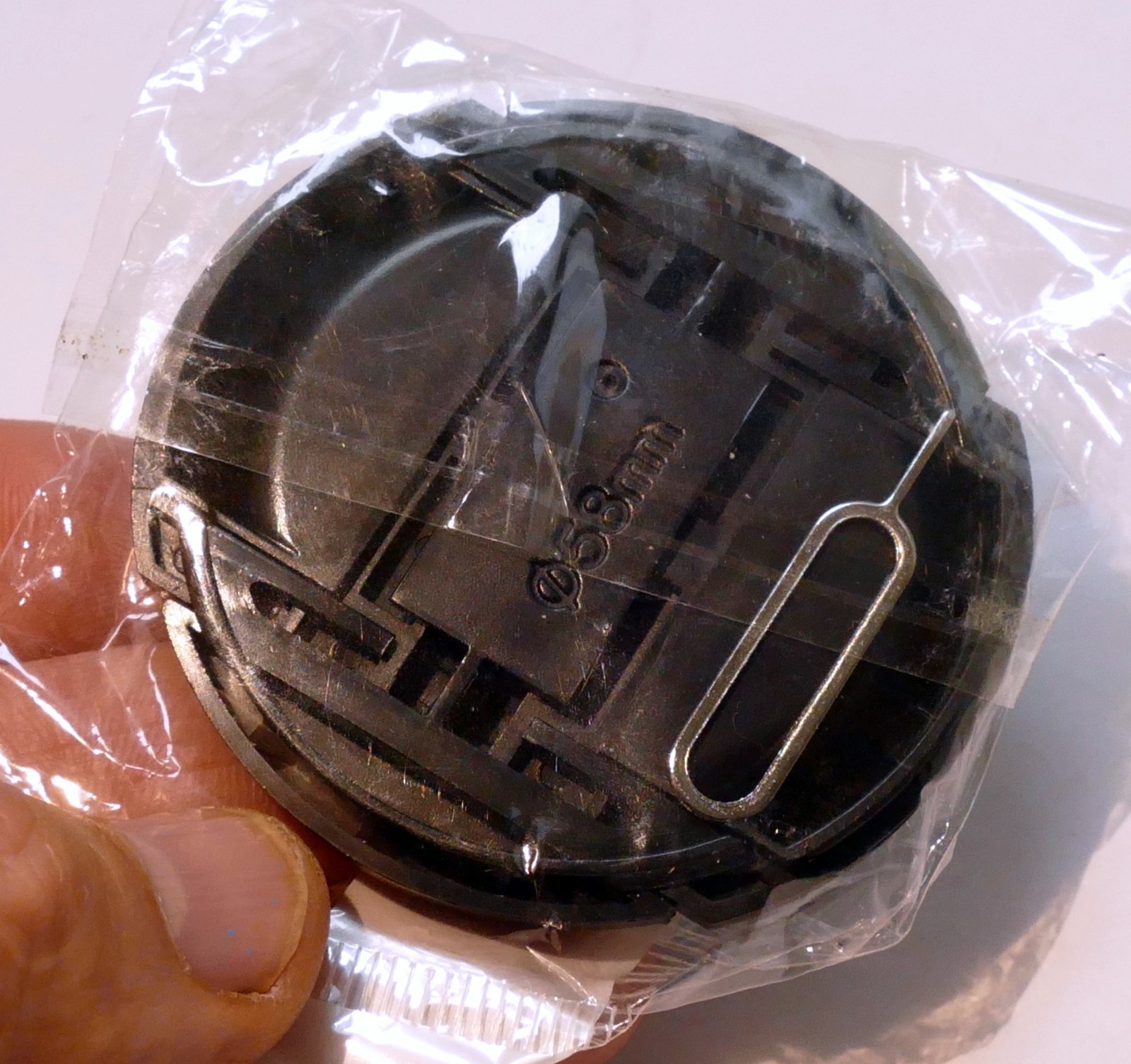 Promaster 58mm Lens Front Cap snap on type plastic w/ string