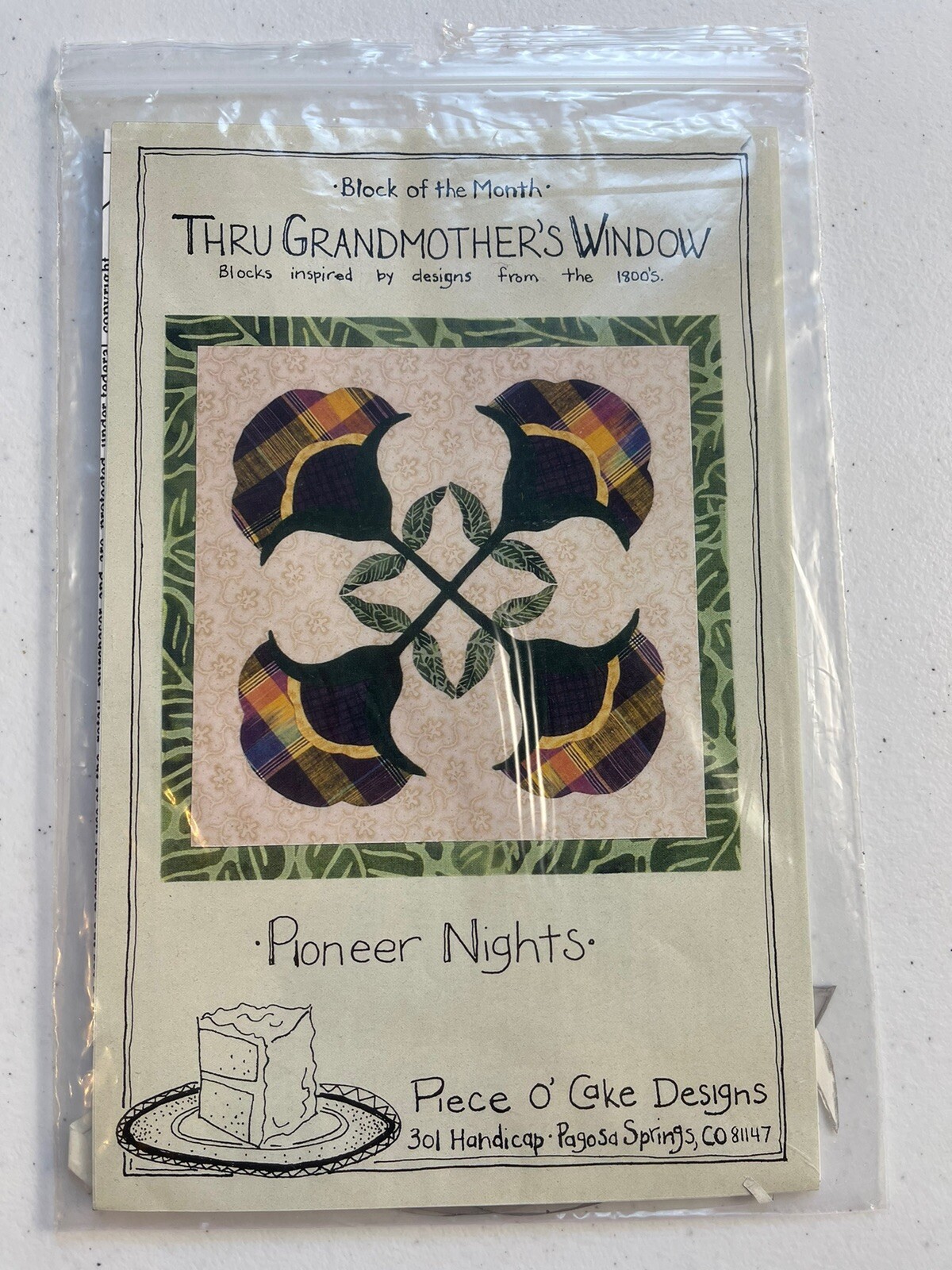 Thru Grandmother’s Window quilt pattern “Pioneer Nights” Piece O’ Cake Designs