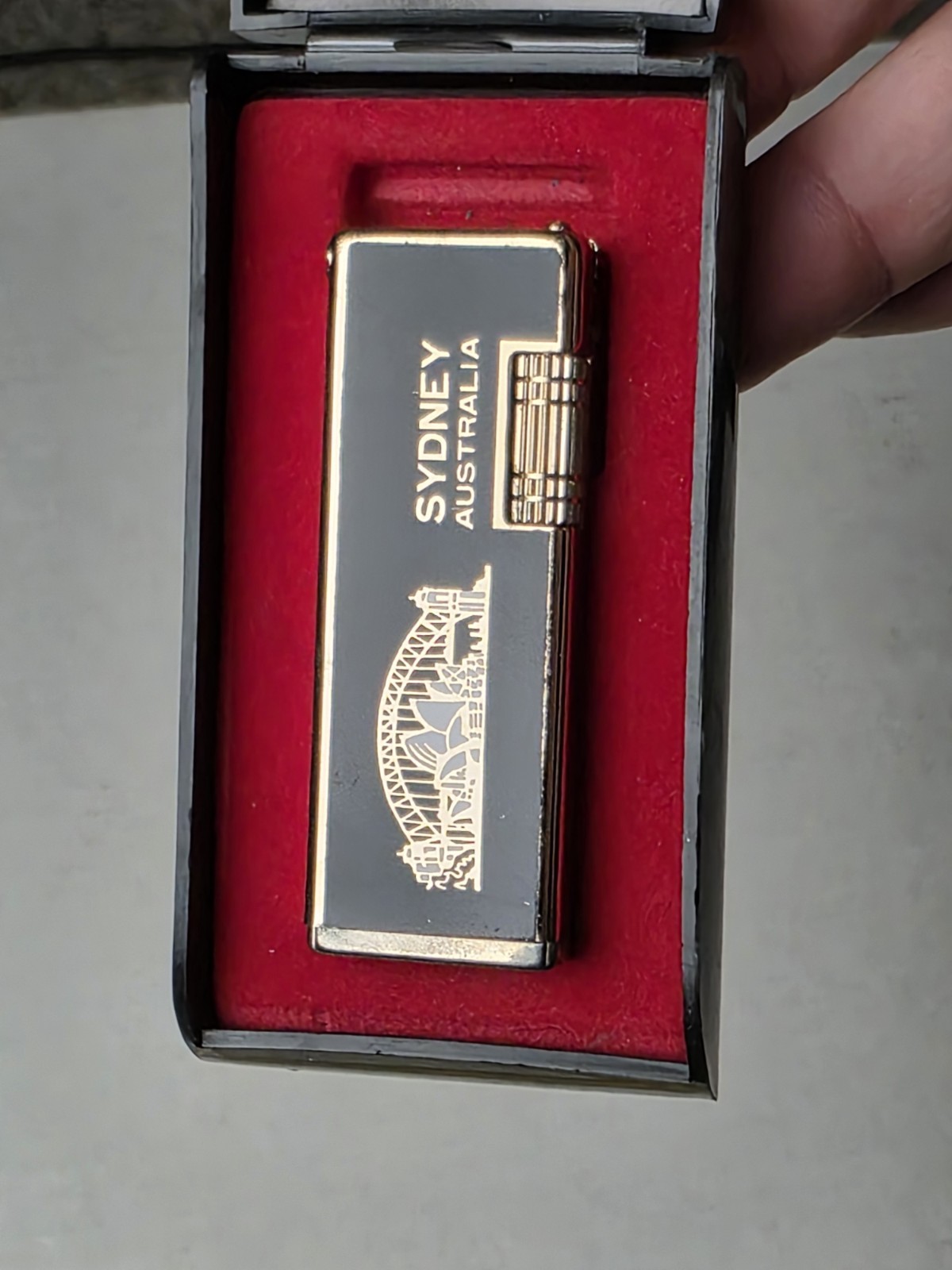Opal high-quality lighter in a Original box.Sydney, Australia, skyline.