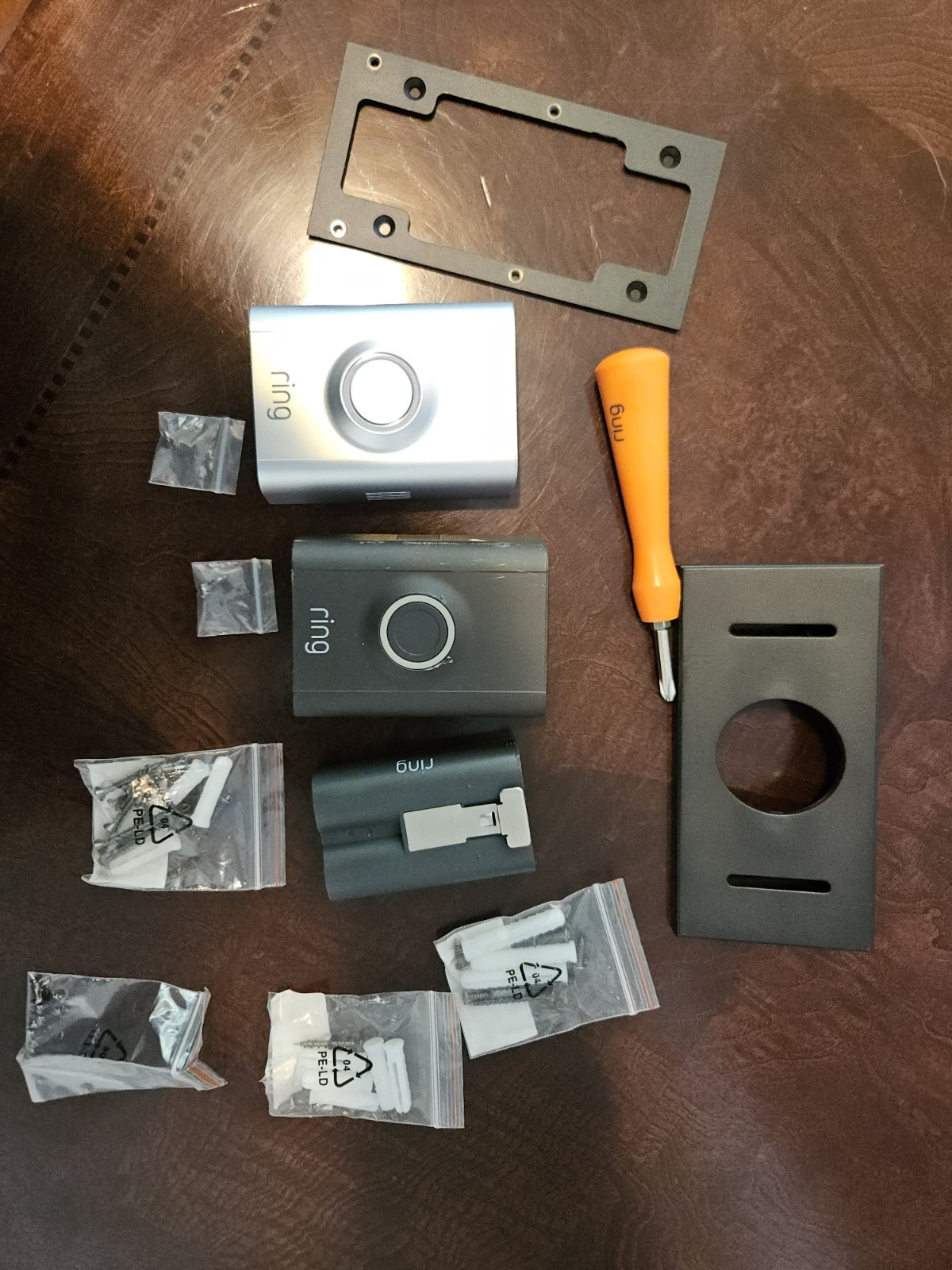 Assorted RING doorbell Items Battery, Security Screws, Tool, Covers
