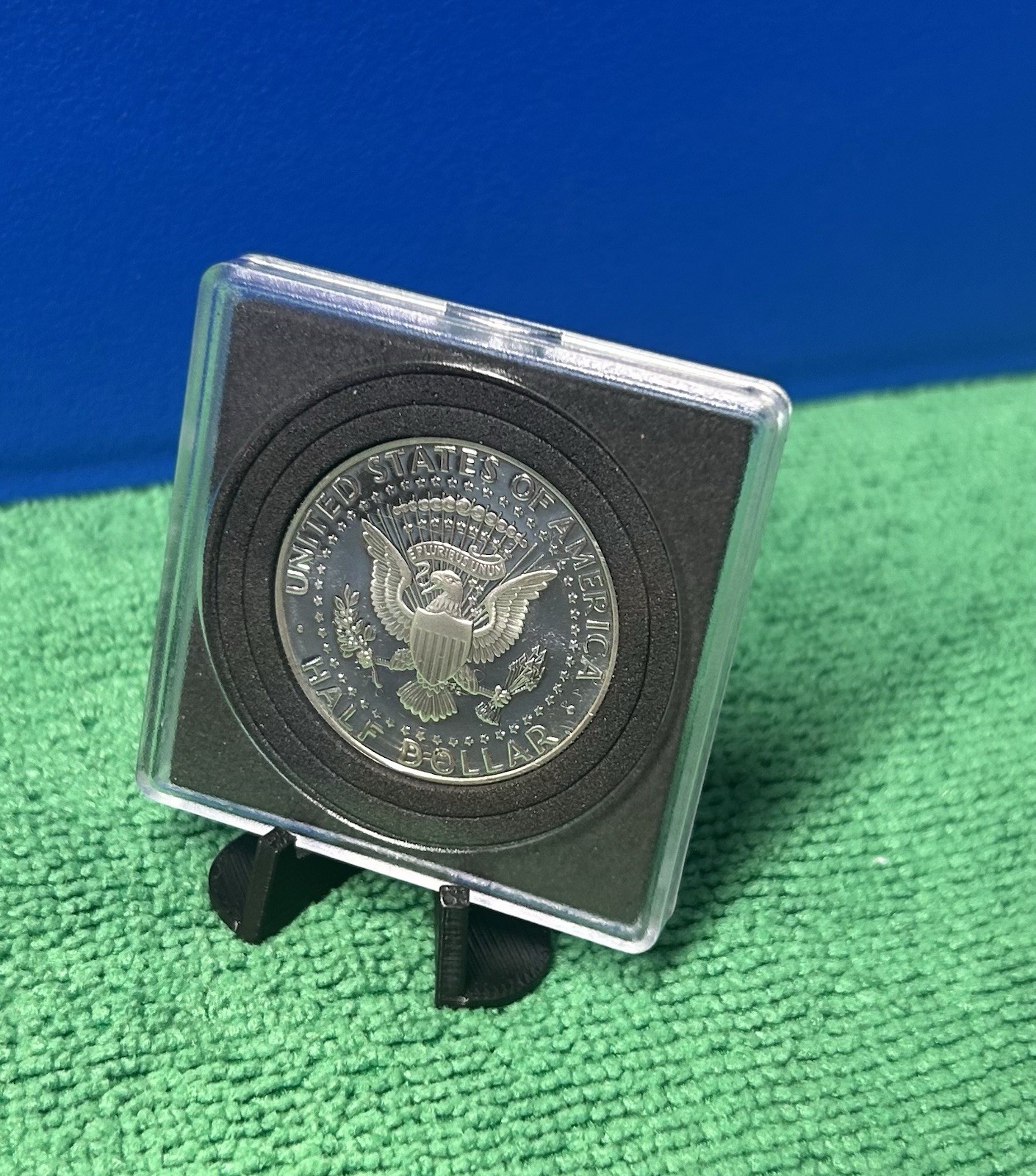 1999-S SILVER PROOF KENNEDY HALF in a plastic holder with stand for displaying